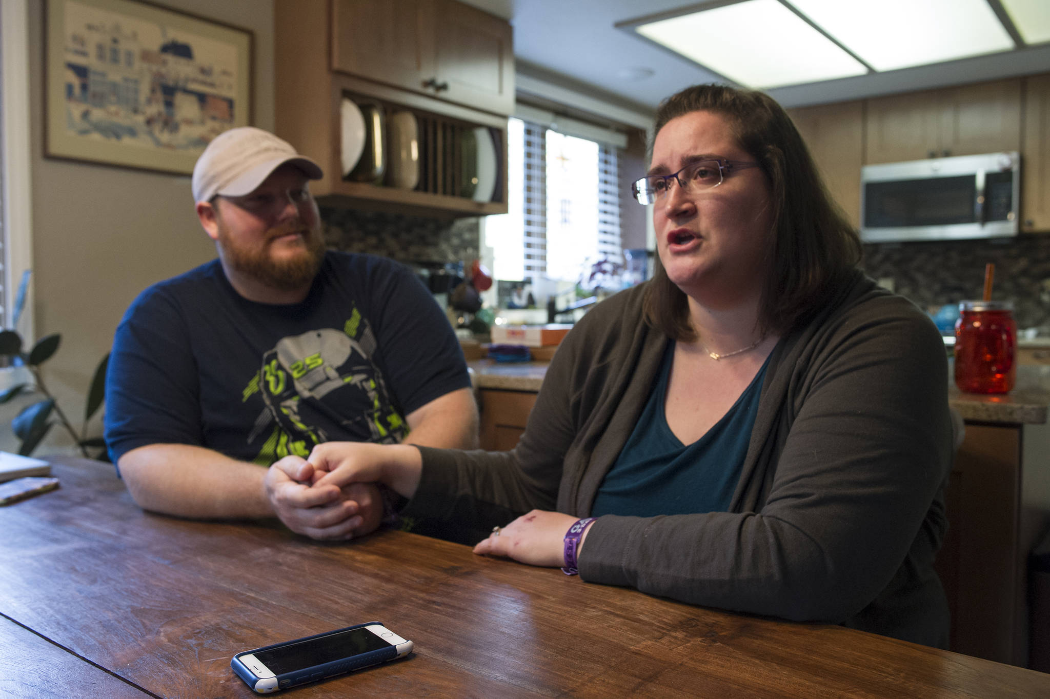 Juneau residents Hilary Rehfield-Green and her husband, Ryan Green, talk Wednesday, Oct. 4, 2017, about surviving the mass shooting at the Route 91 Harvest Music Festival in Las Vegas last weekend. (Michael Penn | Juneau Empire)