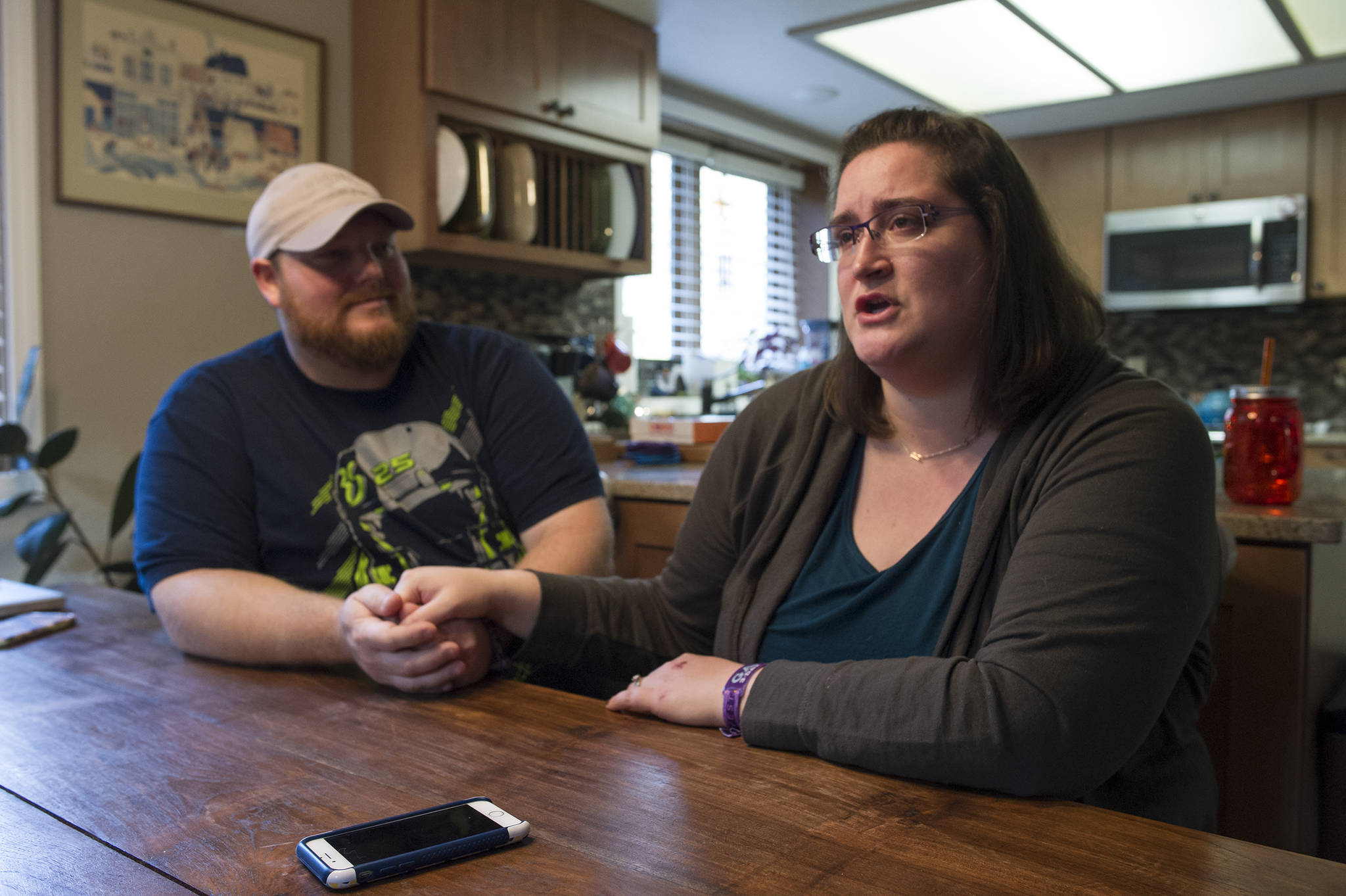 Juneau residents Hilary Rehfield-Green and her husband, Ryan Green, talk Wednesday, Oct. 4, 2017, about surviving the mass shooting at the Route 91 Harvest Music Festival in Las Vegas last weekend. (Michael Penn | Juneau Empire)