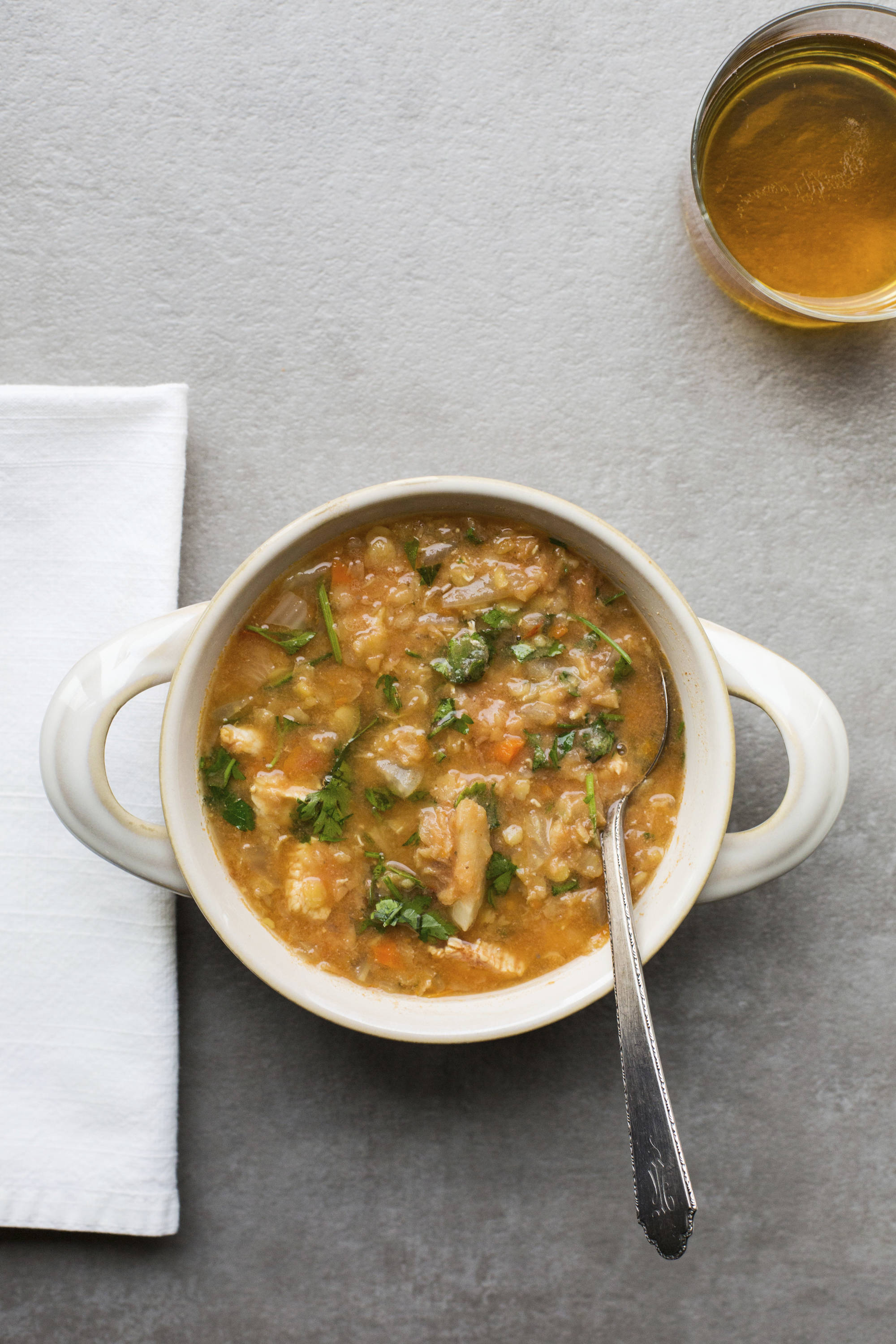 This Nov. 21, 2016 photo shows red lentil and chicken slow-cooker soup in New York. The soup is thick from the lentils, and fragrant with cumin and coriander. (Sarah E Crowder via AP)