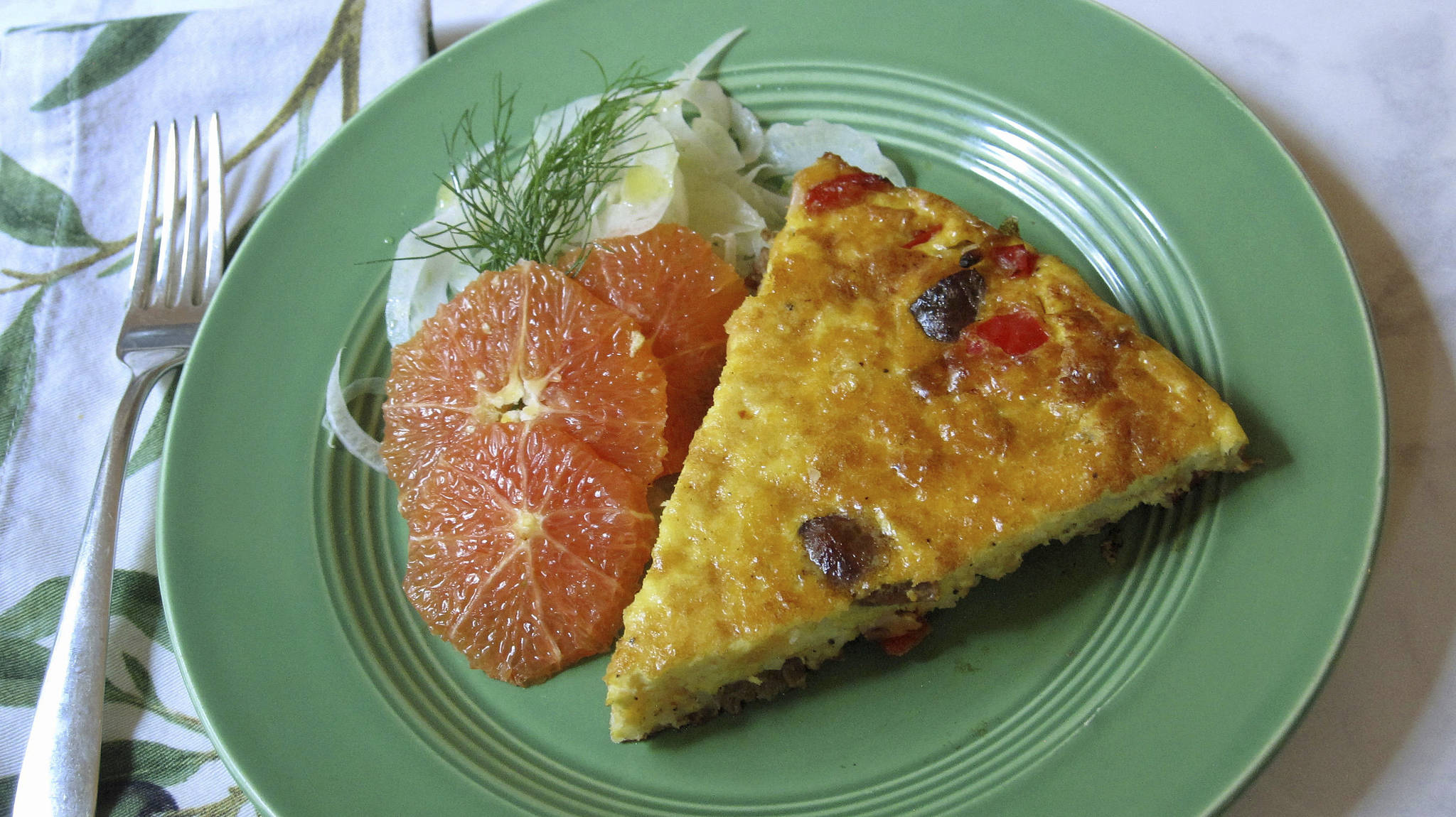 This Oct. 2 photo shows an Italian sausage frittata in New York. This dish is from a recipe by Sara Moulton. (Sara Moulton via AP)