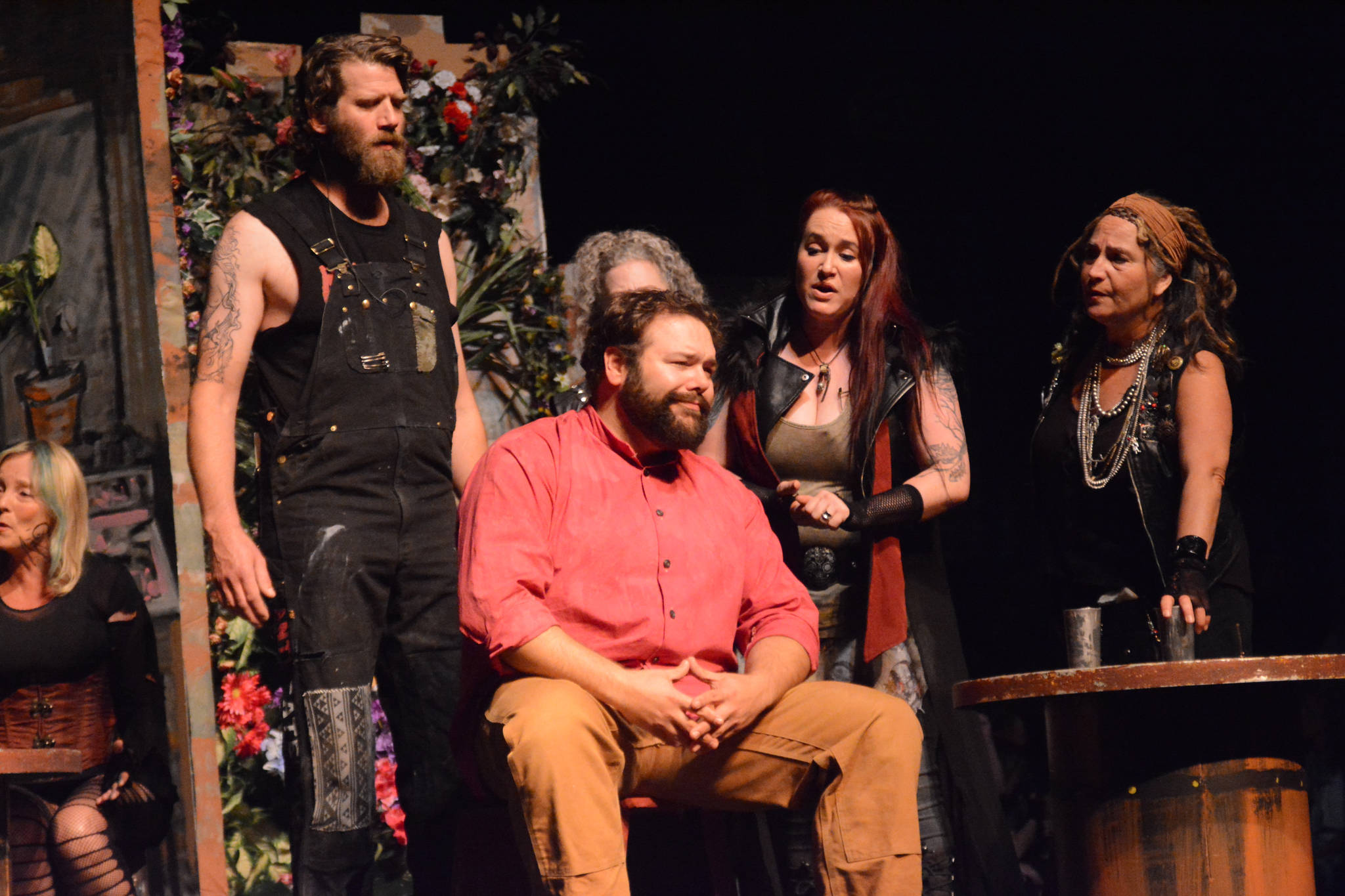 Curtis Jackson, left, as Judas, Kyle Schneider, center, as Jesus, Hannah Heimbuch, right, as Mary Magdalene, and Sally Oberstein, far right, as an apostle, rehearse a scene from “Jesus Christ Superstar” on Monday, Oct. 2, 2017 at the Mariner Theatre in Homer, Alaska. The musical opens Friday, Oct. 6. (Photo by Michael Armstrong, Homer News)