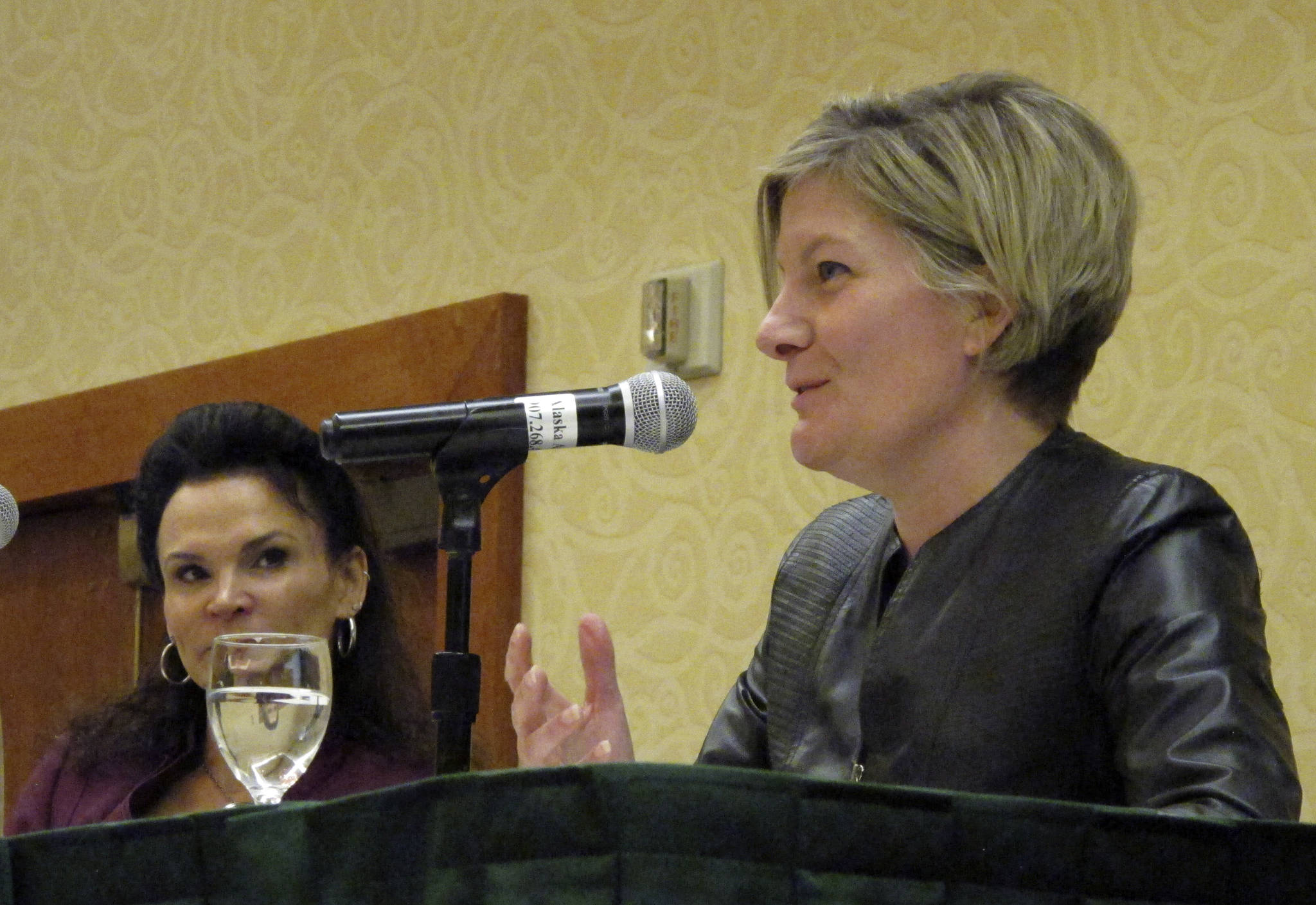Alaska State Attorney General Jahna Lindemuth, right, speaks at the Alaska Native Law Conference Tuesday in Anchorage as Jana Turvey looks on. Lindemuth outlined the state’s position on the traditional form of tribal justice known as banishment. (AP Photo/Rachel D’Oro)