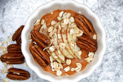 This Oct. 23 photo shows a pumpkin and spice breakfast bowl in Bethesda, Md. Loading up the freezer with these bowls is an excellent plan-ahead strategy, whether you’re a mom of four, or you just want to streamline your mornings. (Melissa D’Arabian via AP)