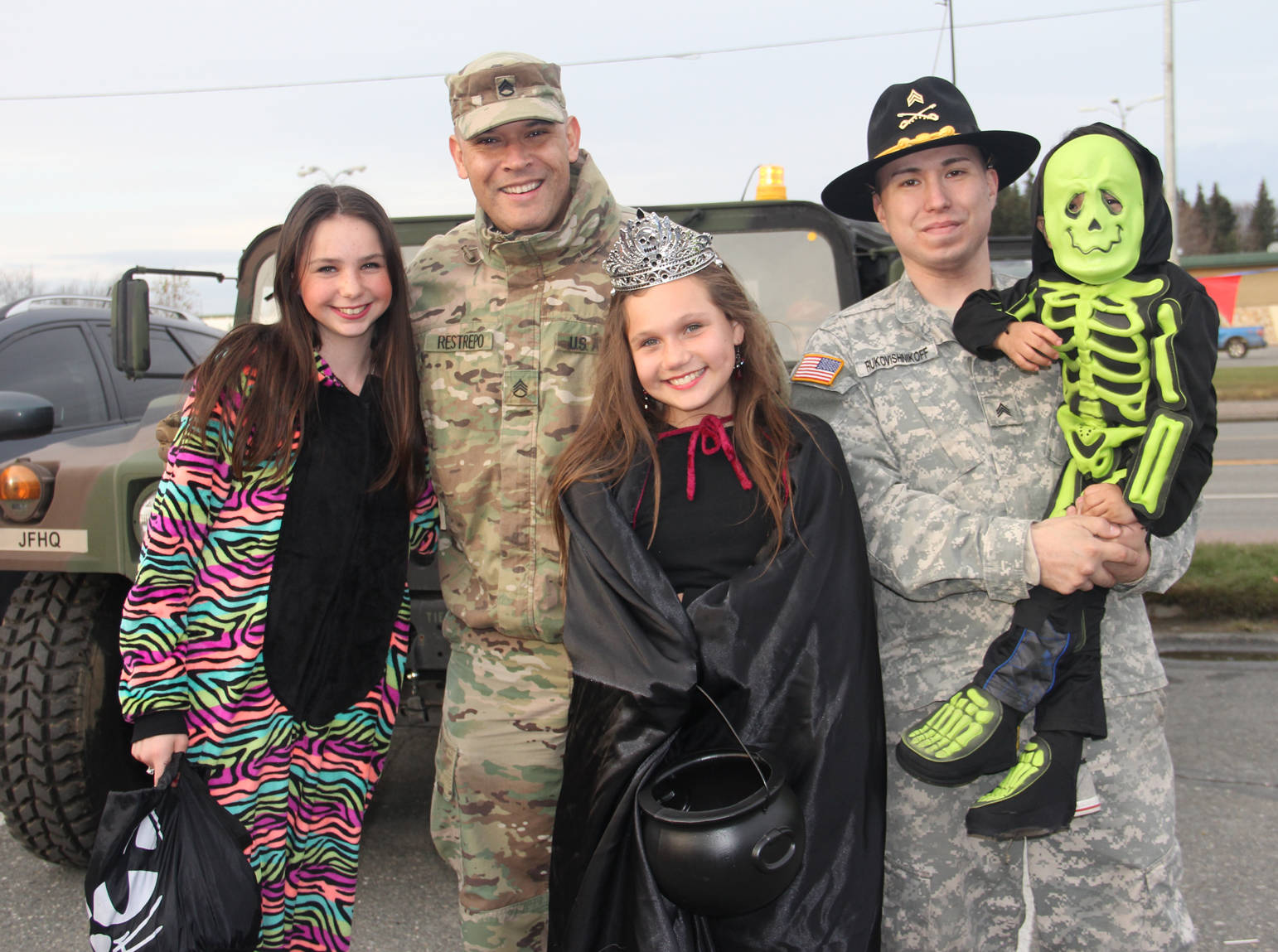 National Guardsmen greet costumed kiddos at annual Trunk or Treat.