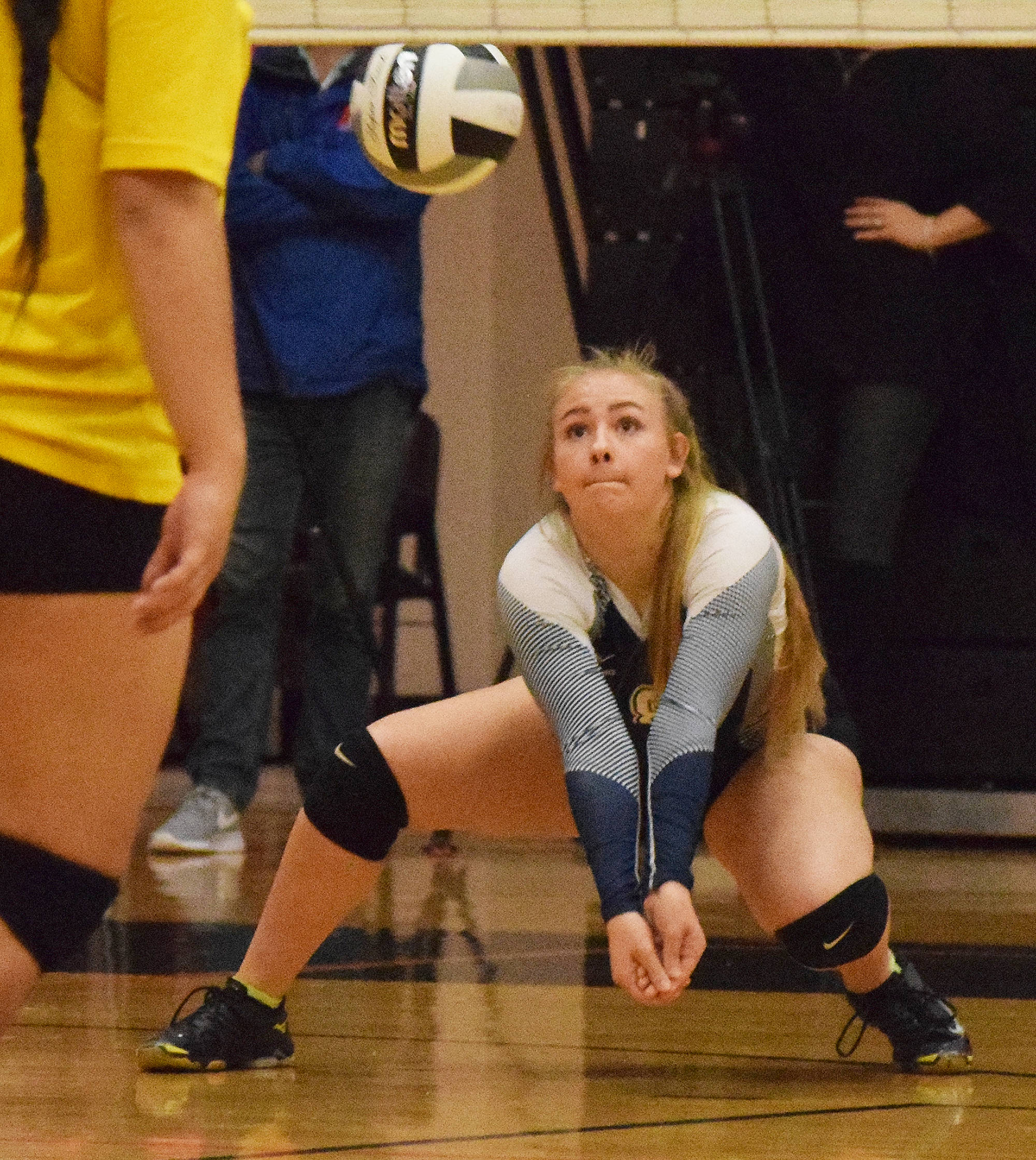 Soldotna junior Brittani Blossom digs a ball Thursday against Bartlett at the Class 4A state volleyball tournament at West High School. (Photo by Joey Klecka/Peninsula Clarion)