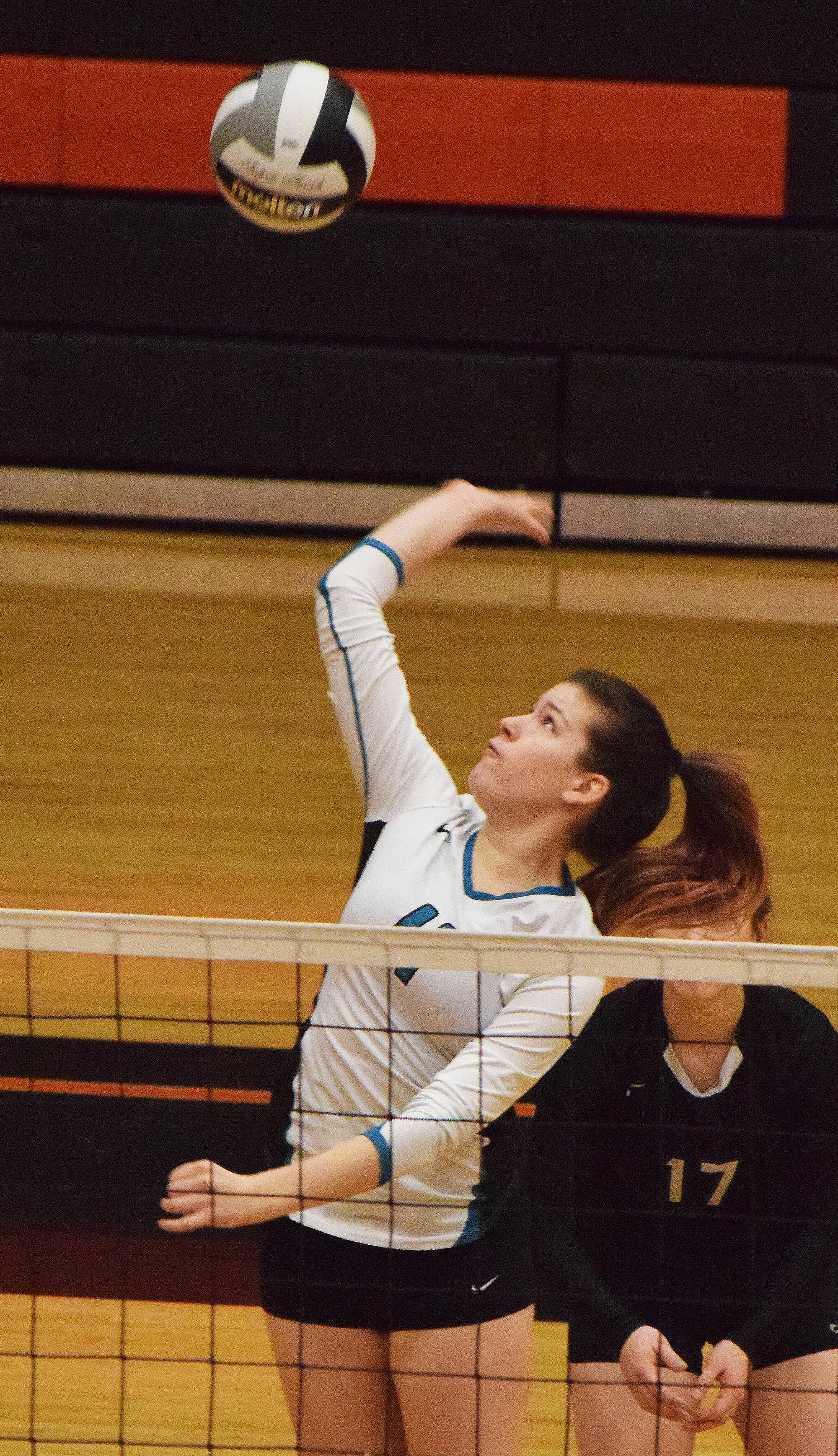 Nikiski senior Emilee Tiner winds up for a shot against Barrow Friday at the Class 3A state volleyball tournament at West High School. (Photo by Joey Klecka/Peninsula Clarion)