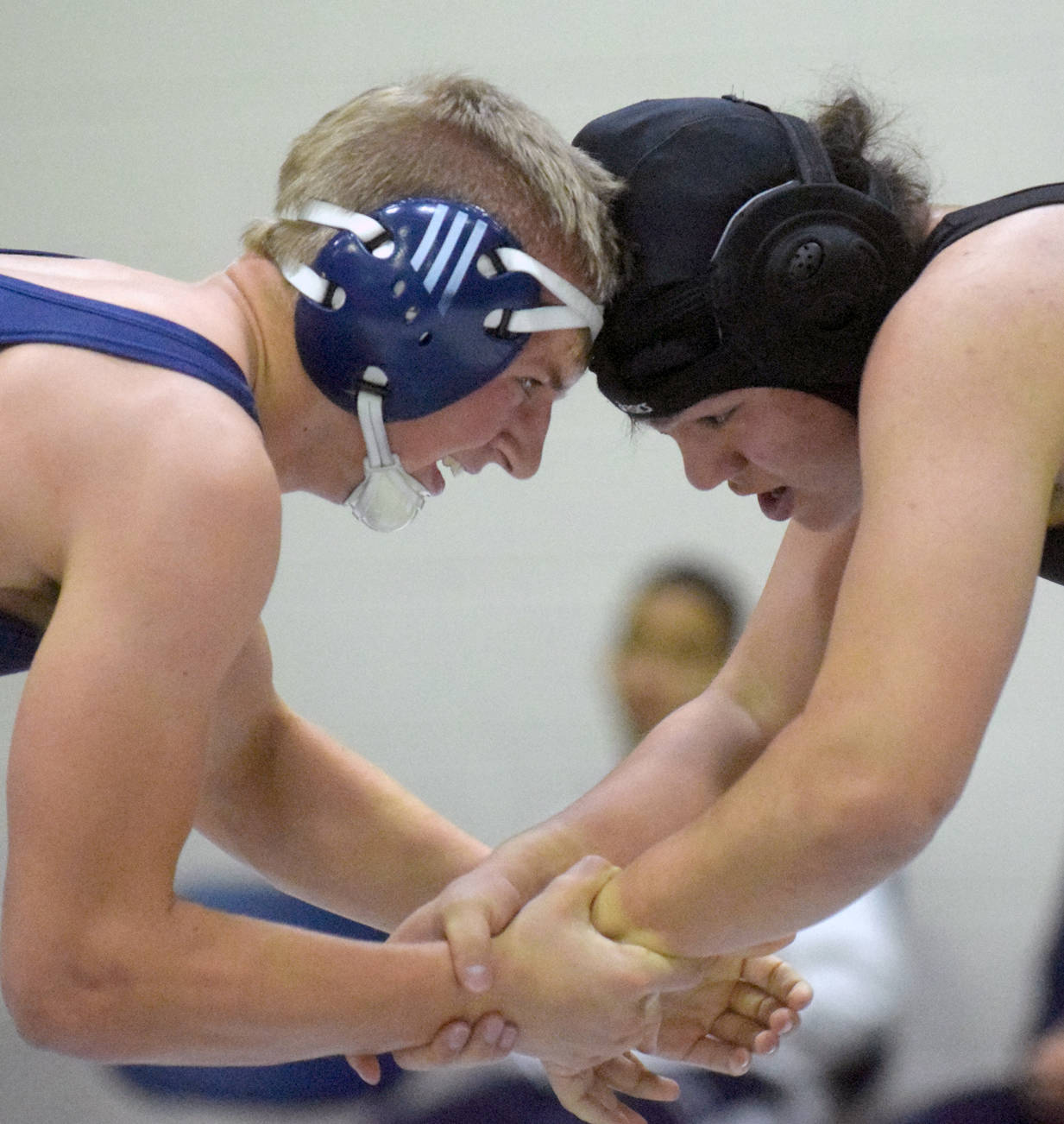 Soldotna’s Hudson Metcalf and Colony’s Frank Urbano tangle at 170 pounds in the third-place dual at the Peninsula Duals on Saturday, Nov. 11, 2017, at Nikiski High School. Urbano won 4-3. (Photo by Jeff Helminiak/Peninsula Clarion)