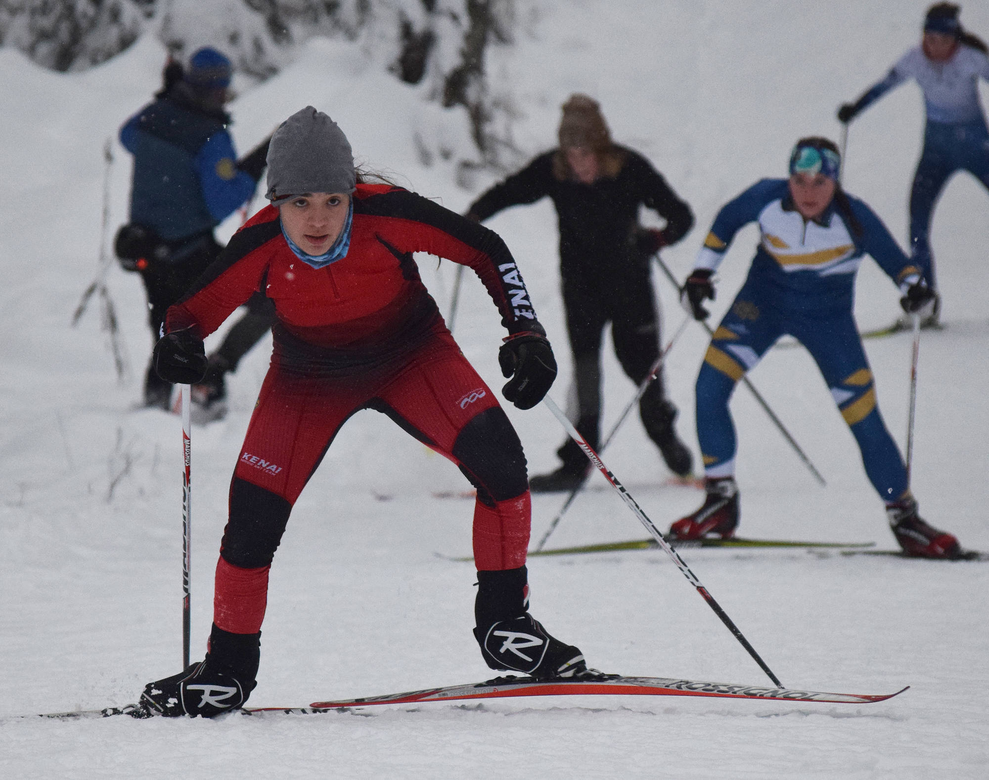 Kenai Central’s Maria Salzetti leads a group of racers up Kill Bill hill Tuesday afternoon at the Turkey Skate race on the Tsalteshi Trails in Soldotna. (Photo by Joey Klecka/Peninsula Clarion)