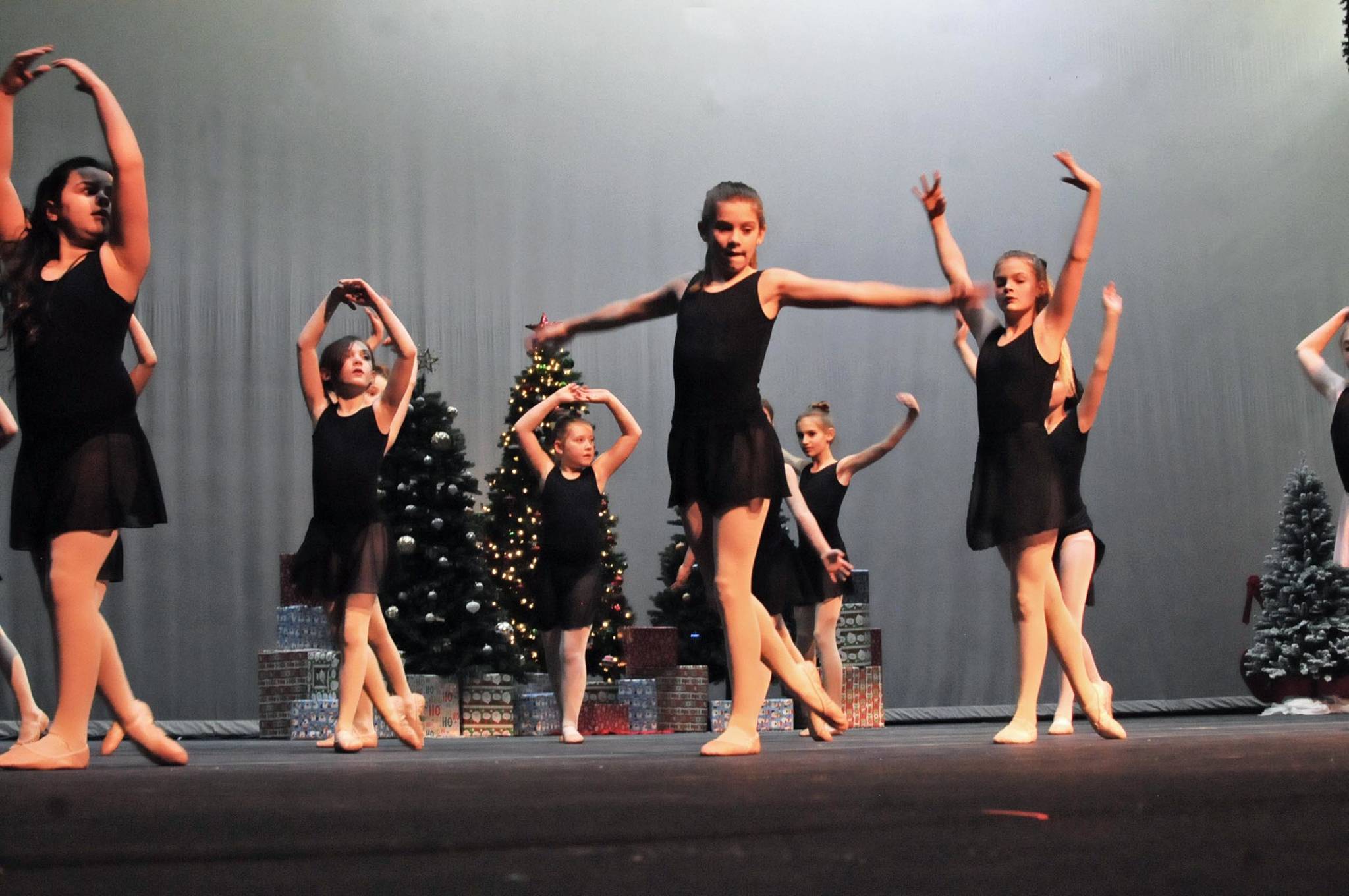 A group of Forever Dance Alaska dancers rehearses for performances at the Forever Christmas show at Kenai Central High School on Tuesday in Kenai. The show, which will run Friday and Saturday at 7 p.m., has a Christmas theme and includes all the dancers of all ages from the Soldotna-based studio. Tickets are $5 at the door. (Photo by Elizabeth Earl/Peninsula Clarion)