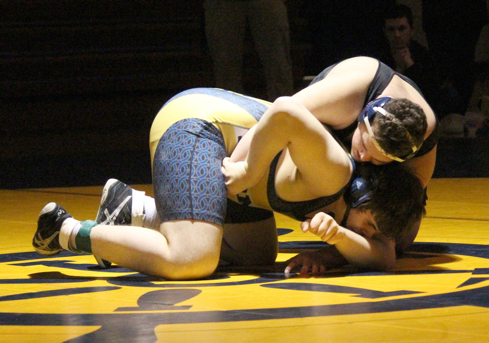 Homer’s Richard Brock struggles to break free from Colony High School’s Brandon Holmes during a wrestling match Thursday, Nov. 30, 2017 at the Alice Witte Gymnasium in Homer. (Photo by Megan Pacer/Homer News)