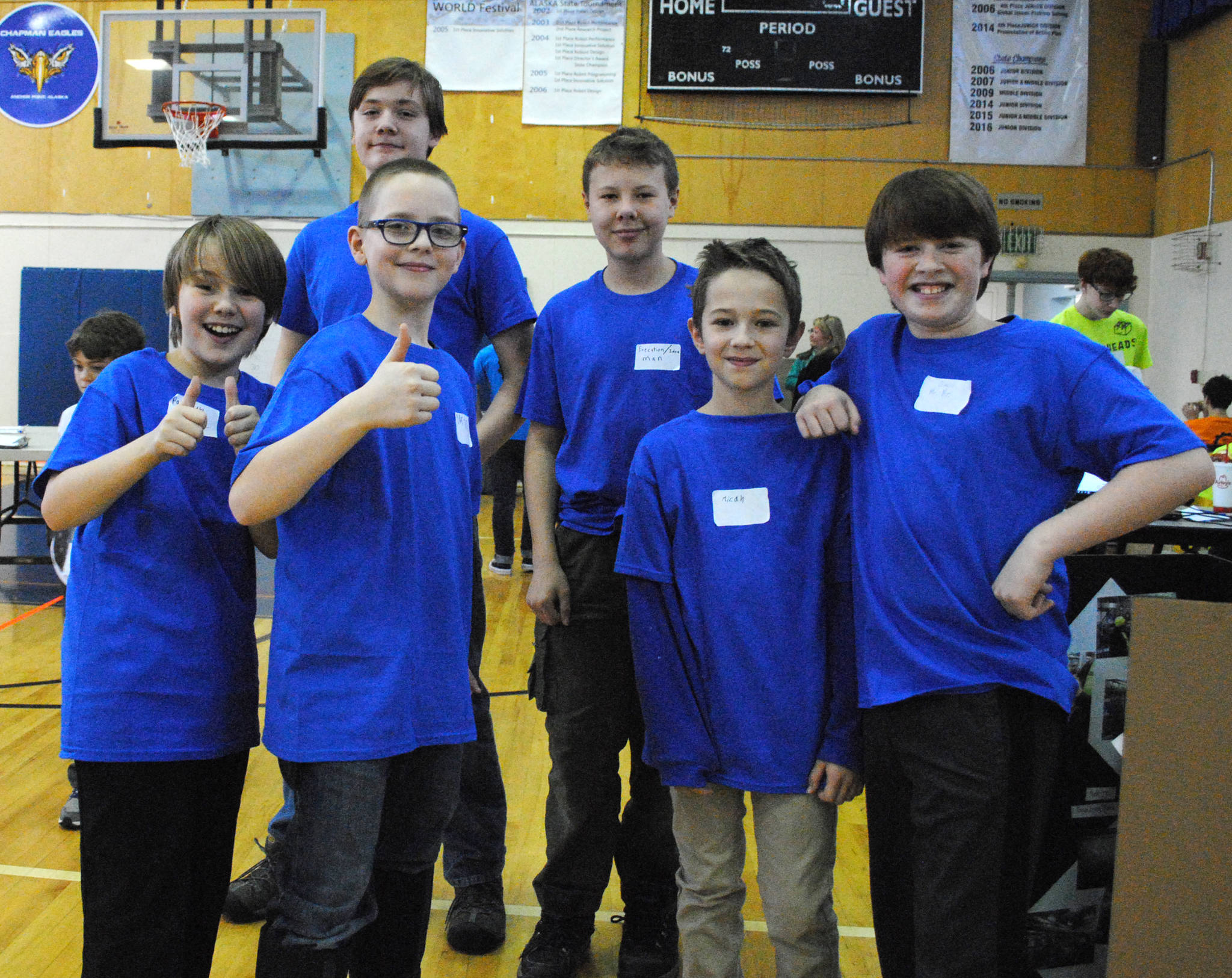 The Kenai home school team ‘Aqua Intelligence’ won top prize for core values on Saturday at the First Lego League competition held at the Aurora Borealis Charter School in Kenai. The event recognized awards in five categories. The champion’s award, project award, core values award, robot design award and robot performance award. The core values award recognizes a team that excels in inspiration, teamwork and gracious professionalism. The ‘Aqua Intelligence’ team showed “extraordinary enthusiasm and spirit” and understand that they can “accomplish more together than they could as individuals.” (Photo by Kat Sorensen/ Peninsula Clarion)