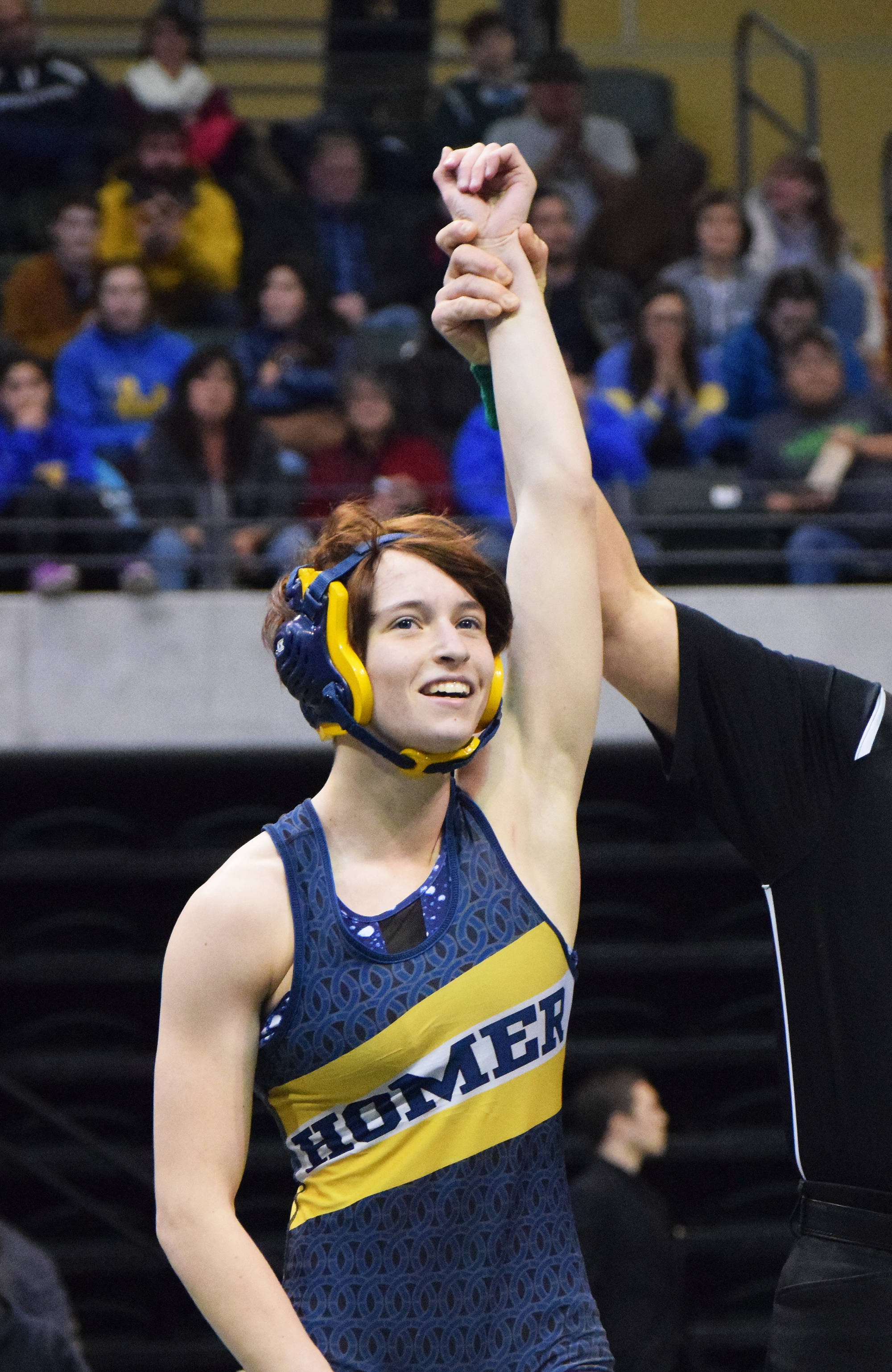 Homer senior Alex Moseley is crowned champion of the girls 120-pound division Saturday night at the Girls State Wrestling Championships at the Alaska Airlines Center in Anchorage. (Photo by Joey Klecka/Peninsula Clarion)