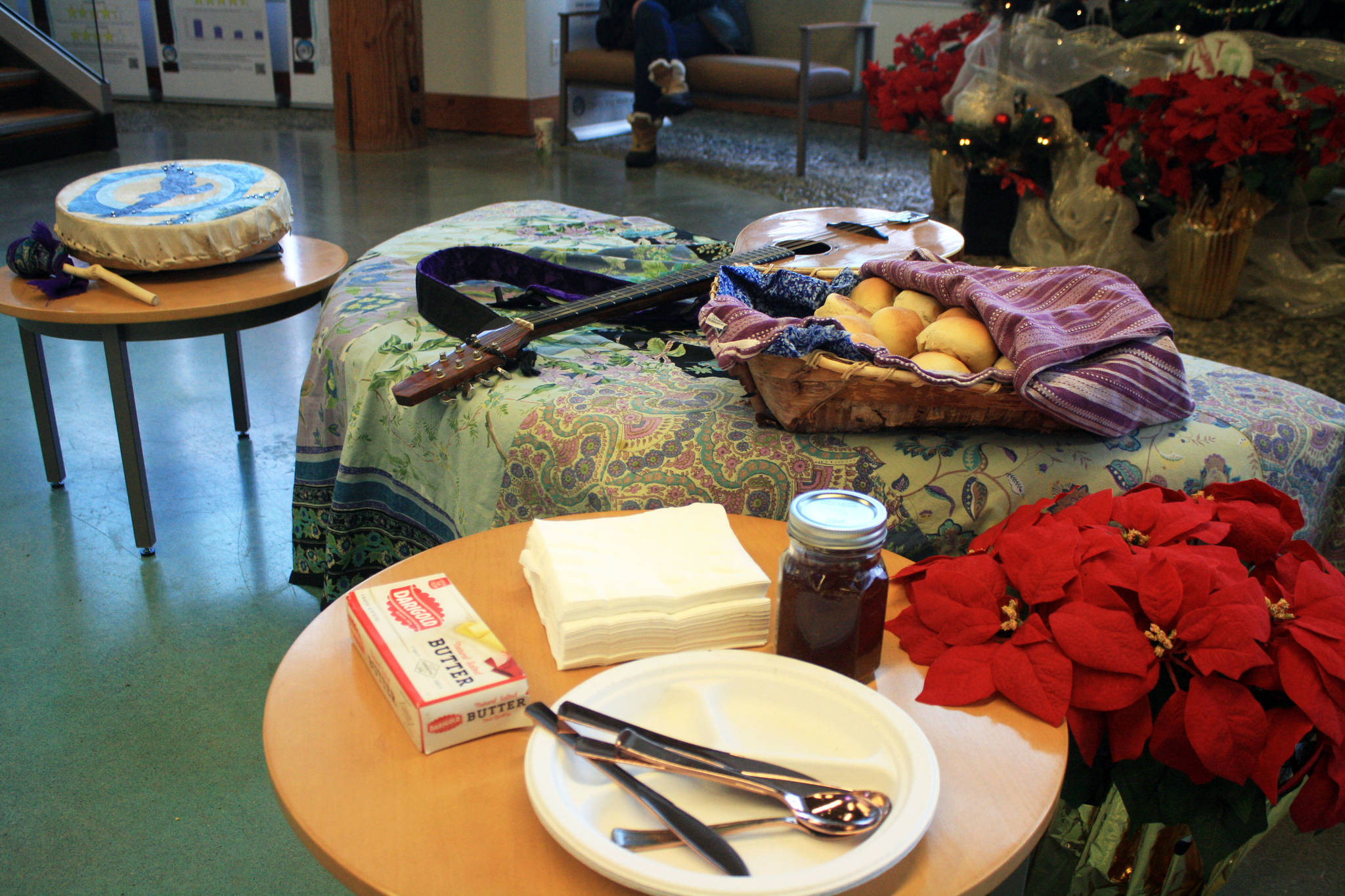 Homemade bread and jelly are provided to the community at a Dec. 21 winter solstice performance at Dena’ina Wellness Center in downtown Kenai. (Photo by Erin Thompson/Peninsula Clarion)