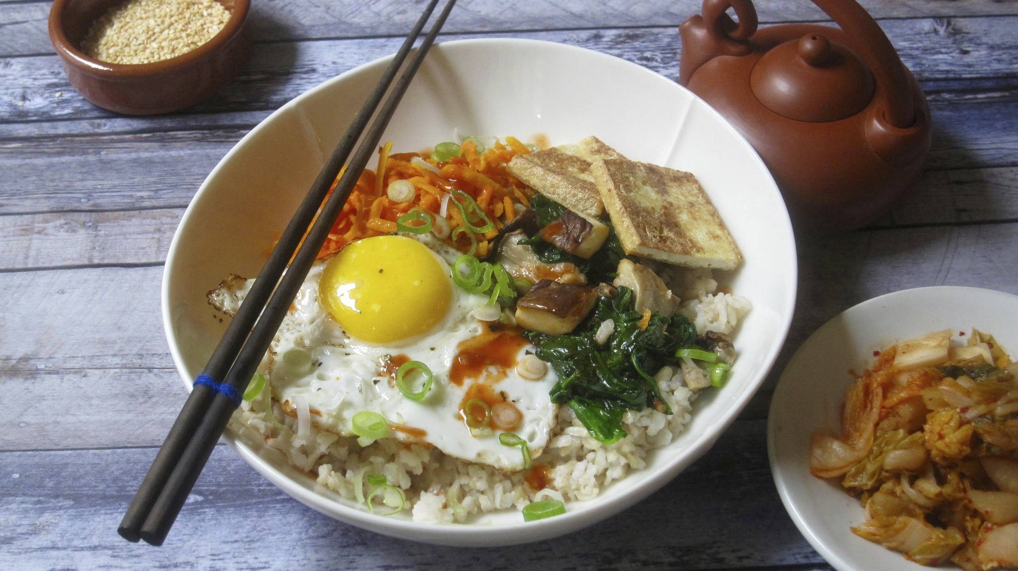 This Dec. 8 photo shows a Korean grain bowl in New York. This dish is from a recipe by Sara Moulton. (Sara Moulton via AP)