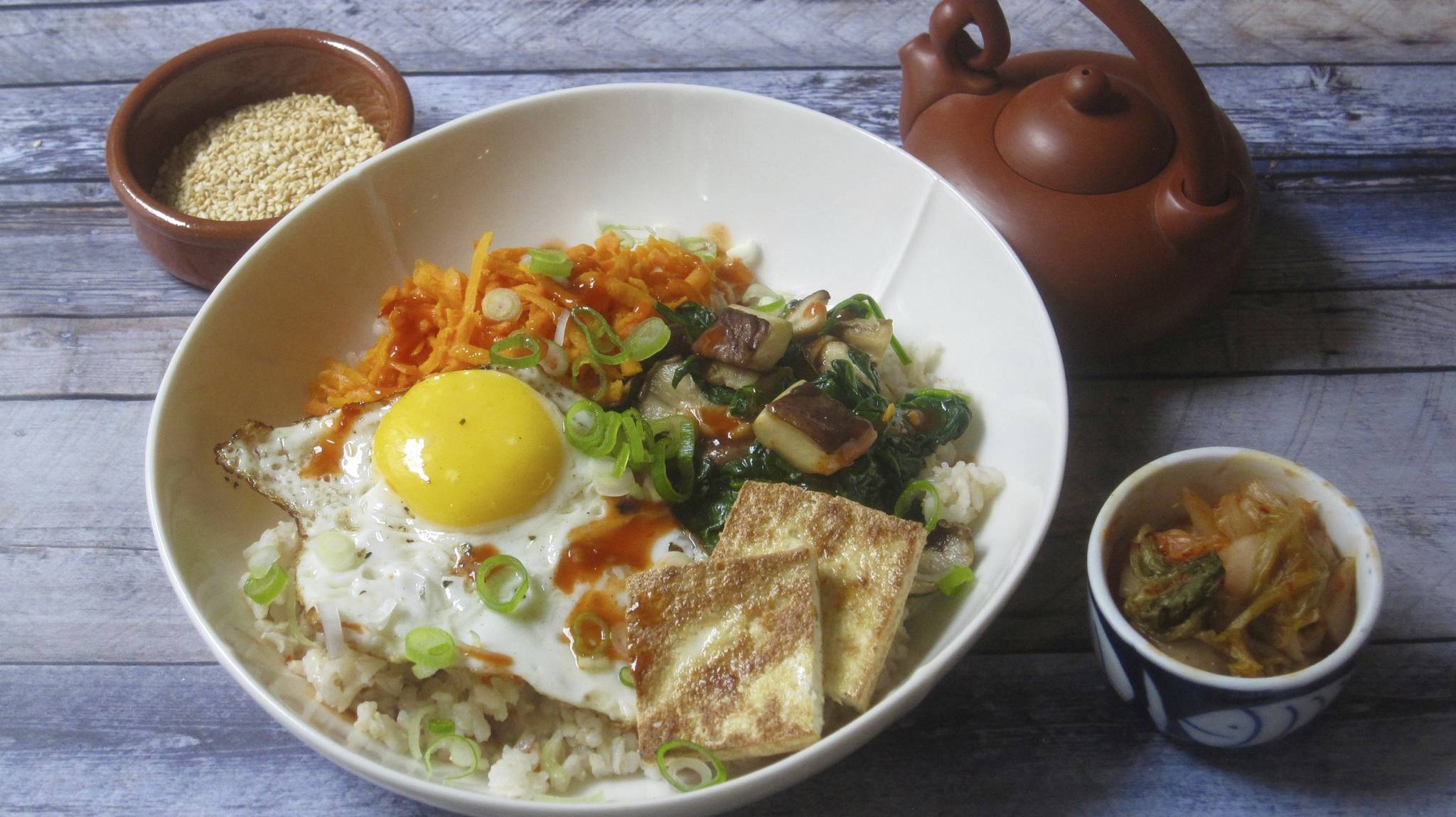 This Dec. 8 photo shows a Korean grain bowl in New York. This dish is from a recipe by Sara Moulton. (Sara Moulton via AP)