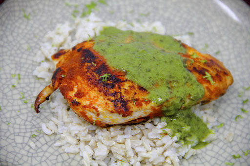 This Jan. 1 photo shows a Thai chicken coconut curry in Bethesda, Md. This dish is from a recipe by Melissa d’Arabian. (Melissa d’Arabian via AP)