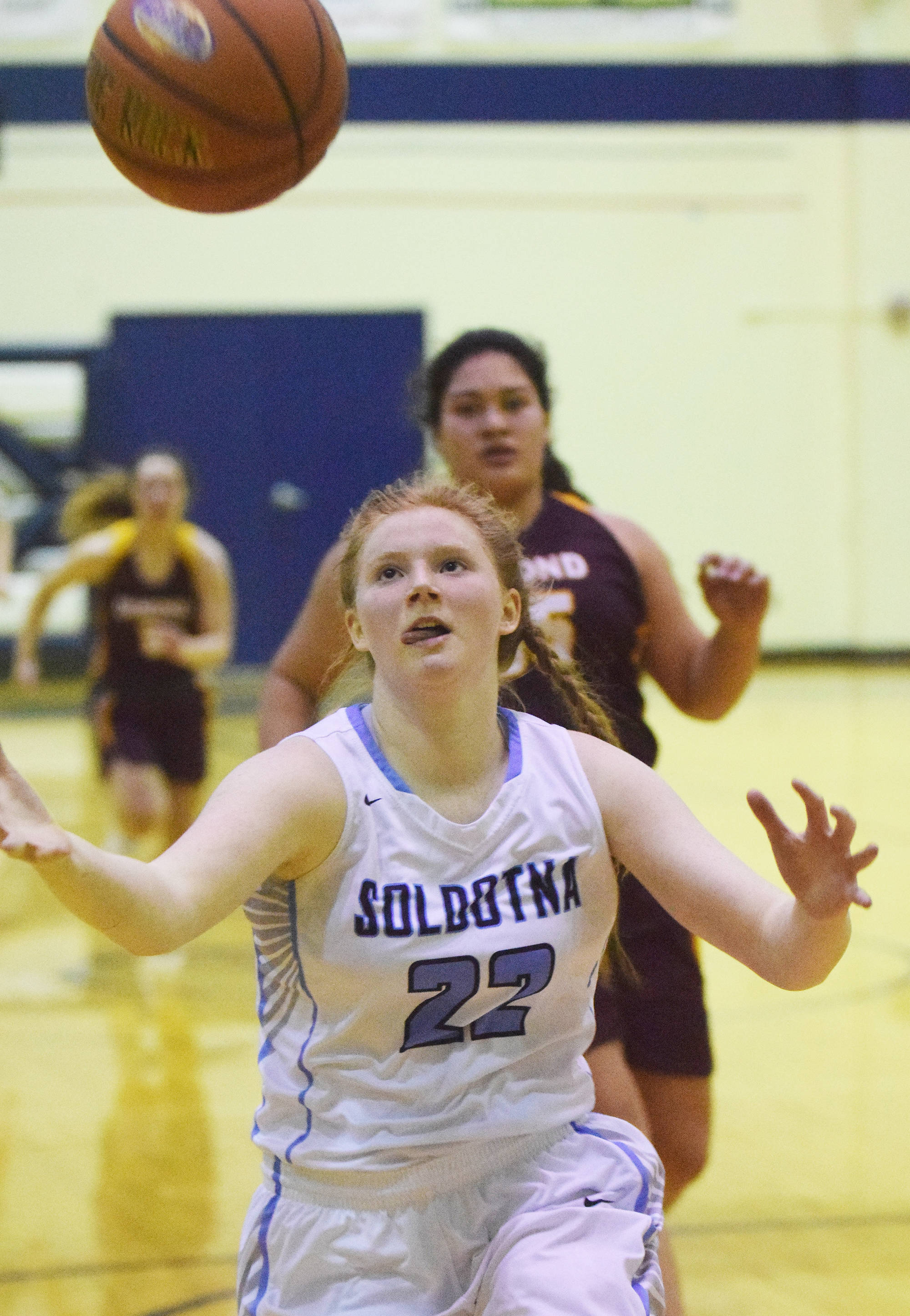 Soldotna sophomore Kianna Holland chases after the ball Saturday night against the Dimond Lynx at Soldotna High School. (Photo by Joey Klecka/Peninsula Clarion)