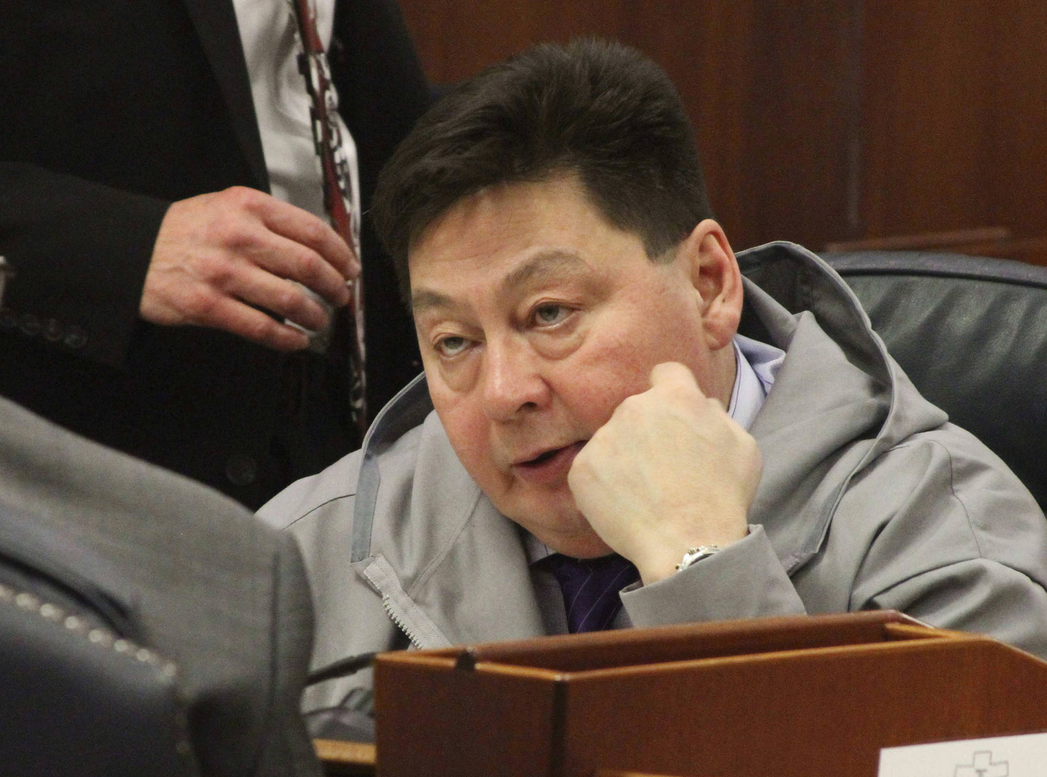 In this Jan. 17, 2017, file photo, state Rep. Dean Westlake, D-Kotzebue, talks with another legislator during a break in the opening session of the Alaska Legislature in Juneau, Alaska. The Alaska Legislature opens a new session Tuesday, Jan. 16, 2018, amid lingering fallout from the resignation of Westlake, accused of inappropriate behavior toward female aides. (AP Photo/Mark Thiessen, File)