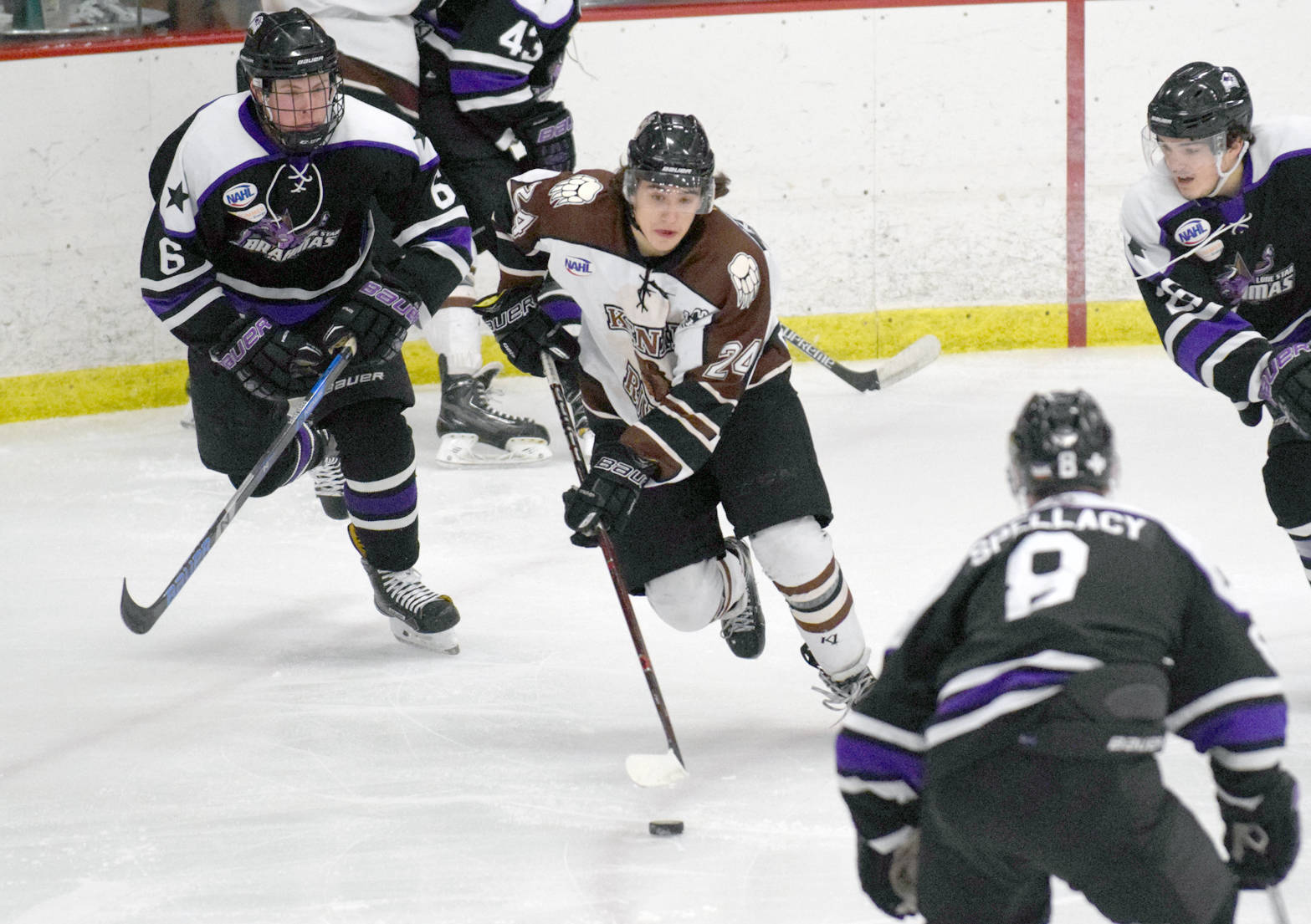 Kenai River’s Zach Krajnik, of Eagle River, prepares to dish to Emils Ezitis for the first goal of the game Friday, Jan. 19, 2018, against the Lone Star (Texas) Brahmas at the Soldotna Regional Sports Complex. (Photo by Jeff Helminiak/Peninsula Clarion)