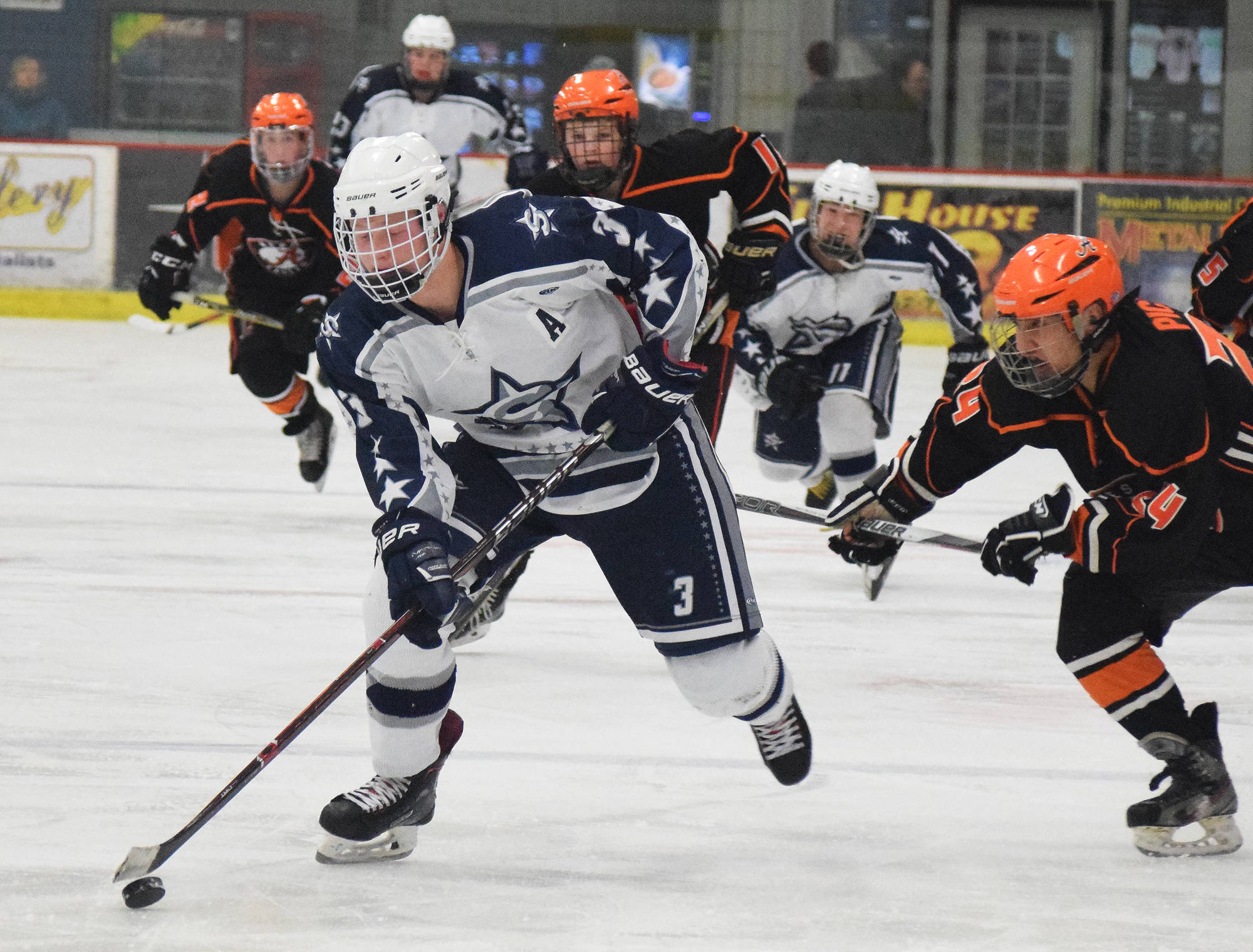 Soldotna sophomore Galen Brantley III breaks away for a shot at the West Anchorage goaltender Saturday afternoon at the Soldotna Regional Sports Complex. (Photo by Joey Klecka/Peninsula Clarion)