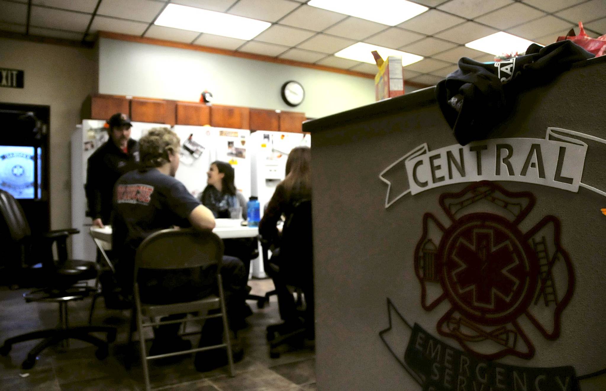 In this Dec. 25, 2015 file photo, Central Emergency Services employees and volunteers and their families gather for a Christmas Day potluck at Station 1 in Soldotna, Alaska. The central station, which handles the majority of the calls for the fire and emergency service area, was originally built in 1957 and last renovated in 1981. The service area is now seeking state funding to reconstruct or relocate the station. (Photo by Elizabeth Earl/Peninsula Clarion, file)