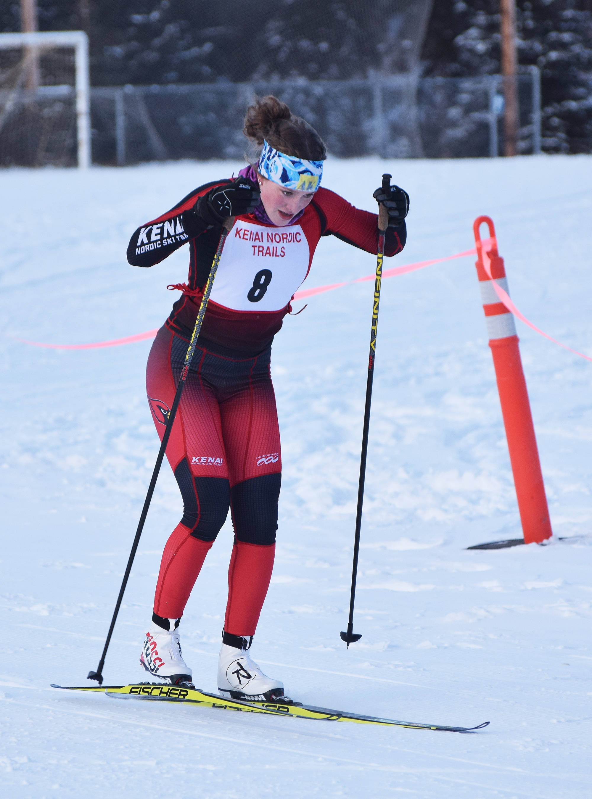 Kenai Central’s Addison Gibson powers her way to the finish line Friday afternoon in the Kenai Klassic races at the Tsalteshi Trails in Soldotna. (Photo by Joey Klecka/Peninsula Clarion)