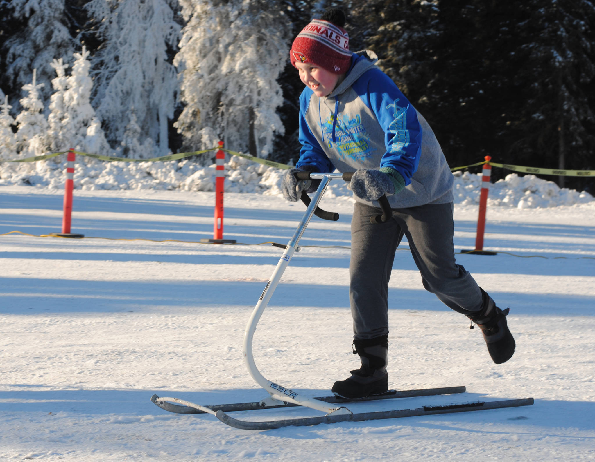Colin Ellsworth enjoys one of the many activities available during the 42nd Kenai Peninsula Winter Games at Soldotna Regional Sports Center in Soldotna, Alaska on Saturday. (Photo by Kat Sorensen/Peninsula Clarion)