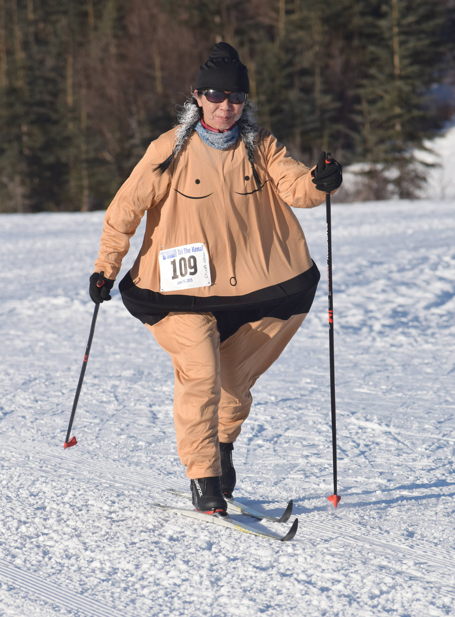 Chisato Johnson shows off the sumo costume that was voted best costume at the Ski For Women on Sunday, Feb. 4, 2018, at Tsalteshi Trails. (Photo by Jeff Helminiak/Peninsula Clarion)