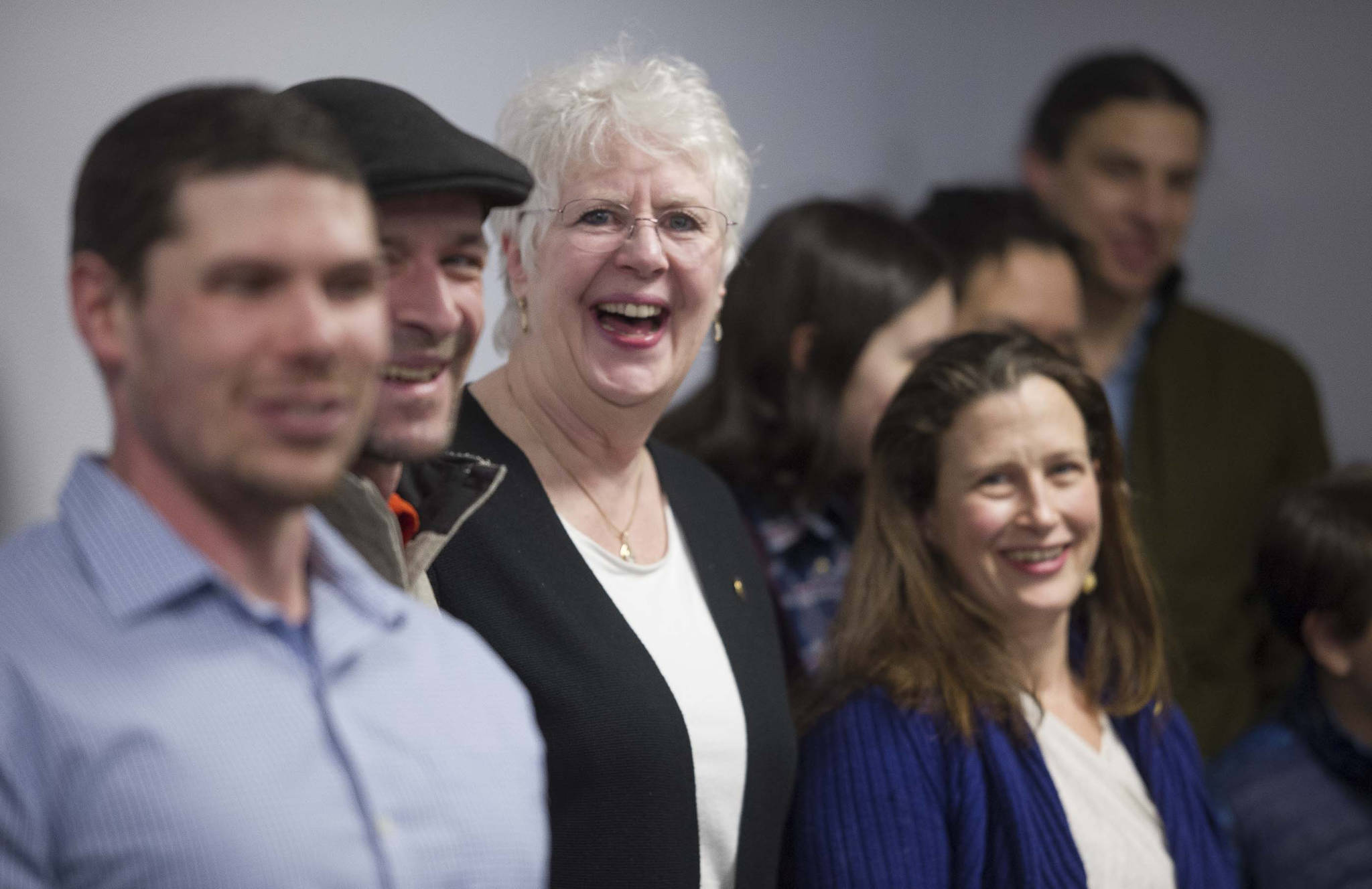 Local commercial fishermen pose for a picture with Rep. Louise Stutes, R-Kodiak, center, after delivering a letter in support for her fisheries bill at the Capitol on Thursday, Feb. 1, 2018. (Michael Penn | Juneau Empire)