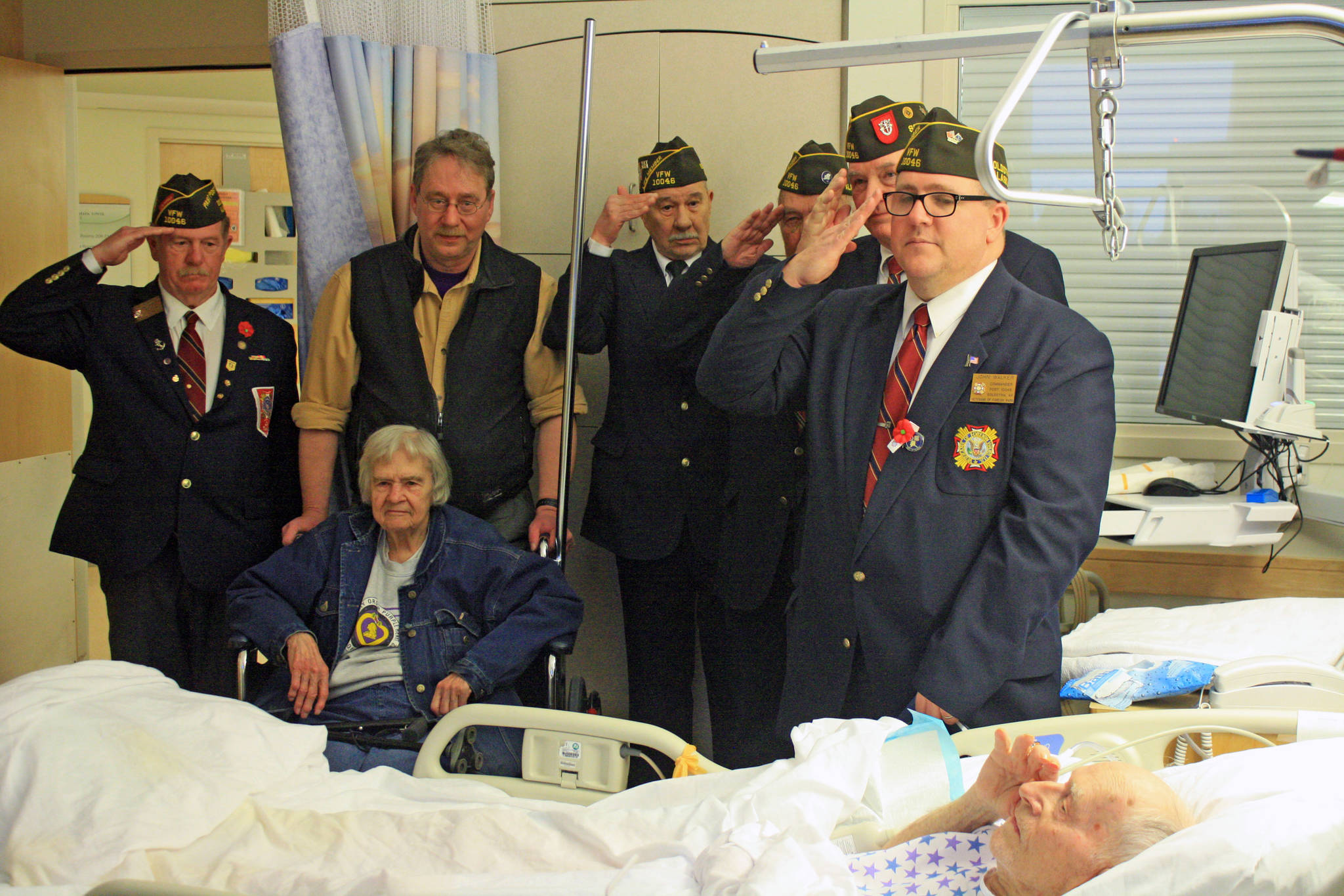 Members of the Soldotna Veterans of Foreign Wars post honor World War II veteran Bill Field for 70 years of service in the VFW at the Central Peninsula Hospital on Monday. (Photo by Erin Thompson/Peninsula Clarion) Members of the Soldotna Veterans of Foreign Wars post honor World War II veteran Bill Field for 70 years of service in the VFW at the Central Peninsula Hospital on Feb. 5. (Photo by Erin Thompson/Peninsula Clarion)