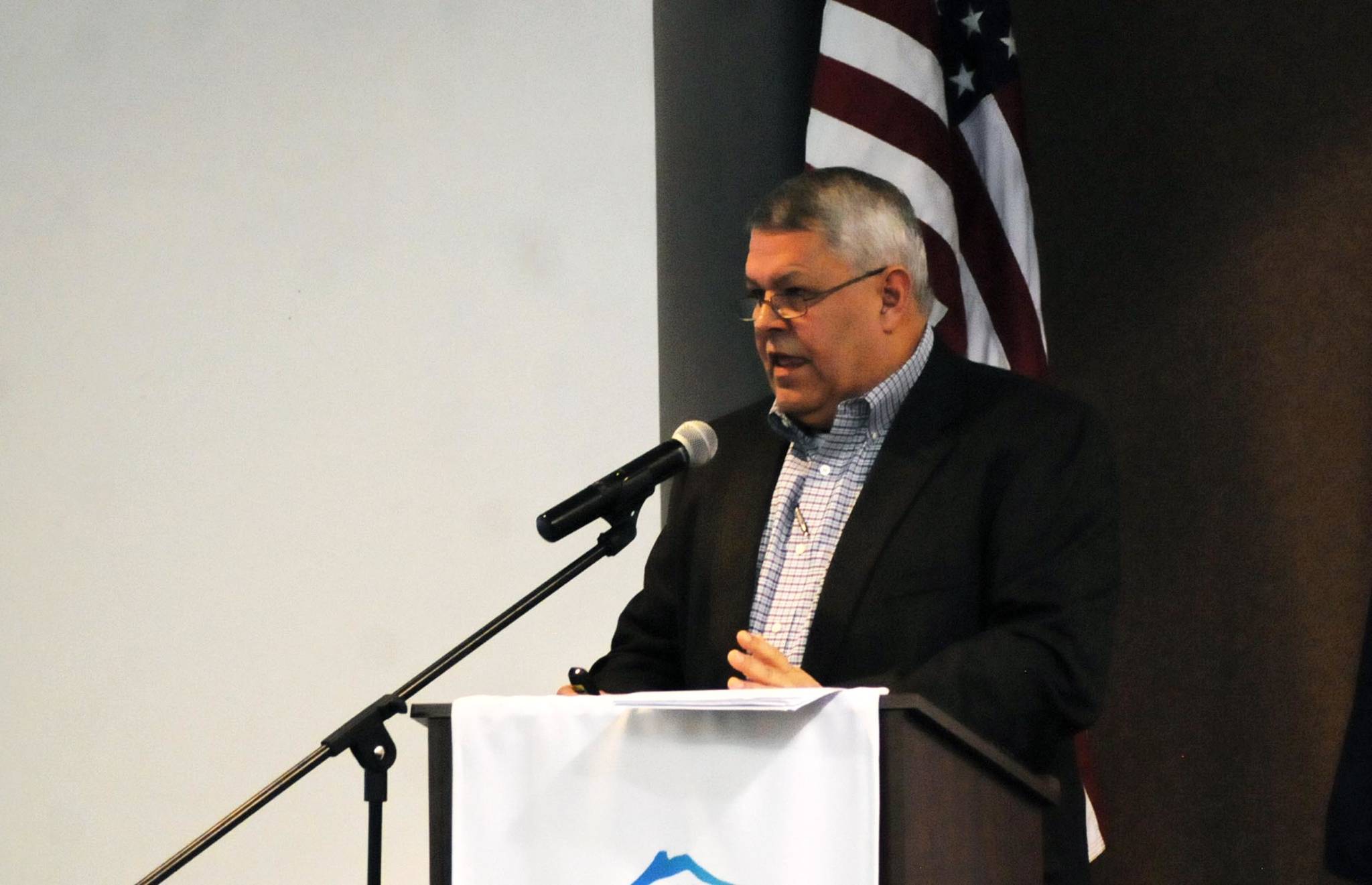 Borough Mayor Charlie Pierce speaks to the attendees at a joint luncheon of the Kenai and Soldotna chambers of commerce Wednesday, Feb. 7, 2018 in Kenai, Alaska. Pierce says he plans to fix the borough’s approximately $4 million deficit in the fiscal year 2019 budget without raising taxes or implementing new ones. (Photo by Elizabeth Earl/Peninsula Clarion)