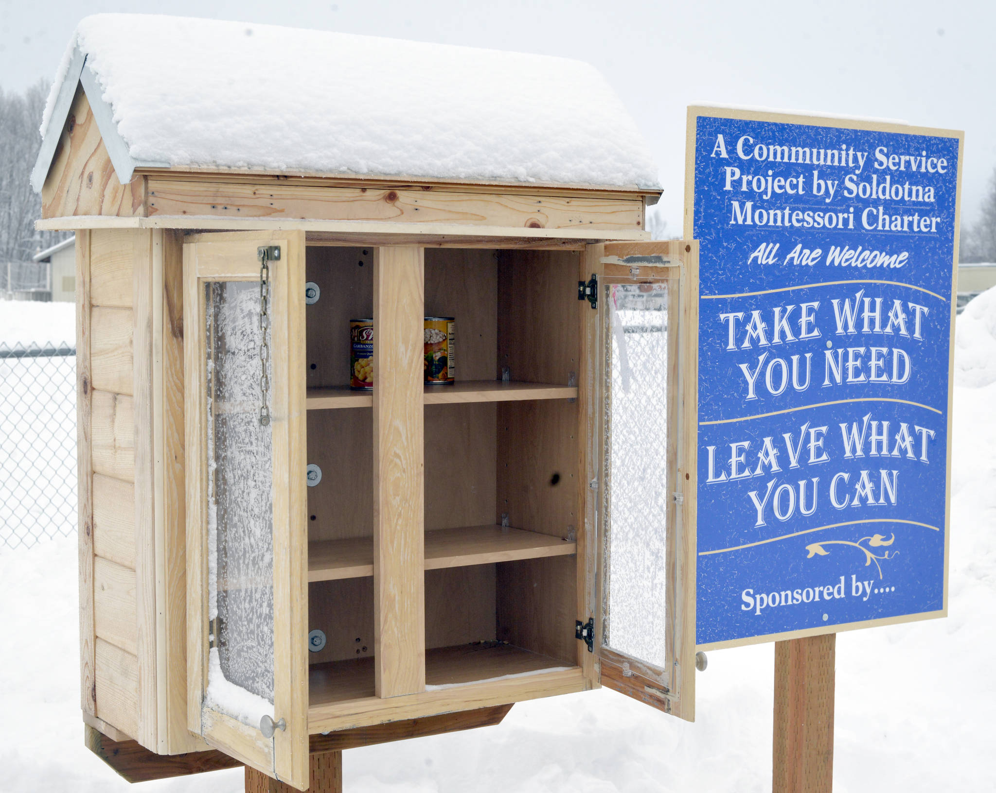 The Soldotna Montessori Charter School food pantry is located on the corner of North Binkley Street and East Park Avenue, right across the street from the Kenai Peninsula Borough Hall building. (Photo by Kat Sorensen/Peninsula Clarion)
