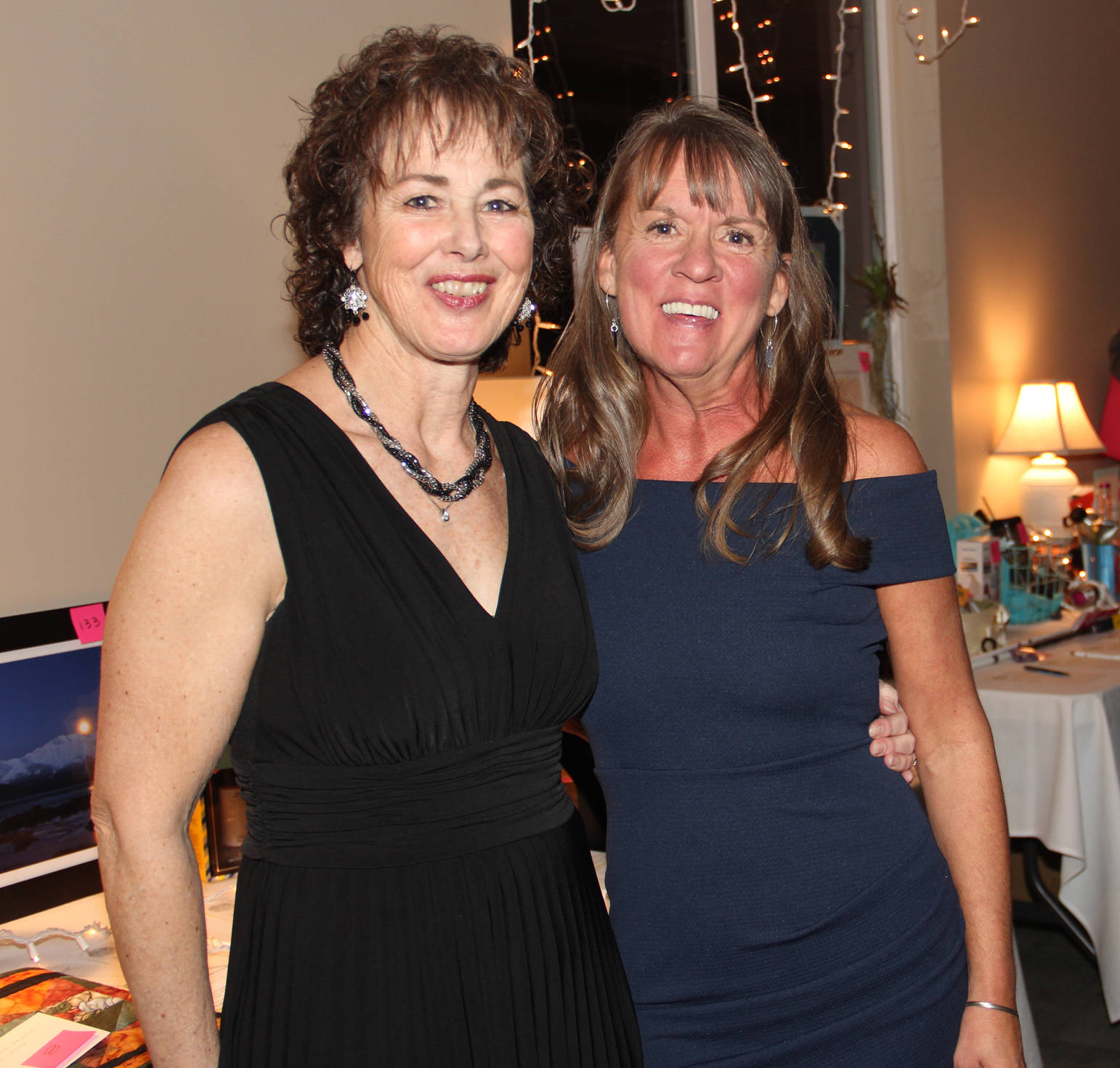 Mary Green and Terri Birchfield are the long time Hospice Wine Tasting event organizers.
