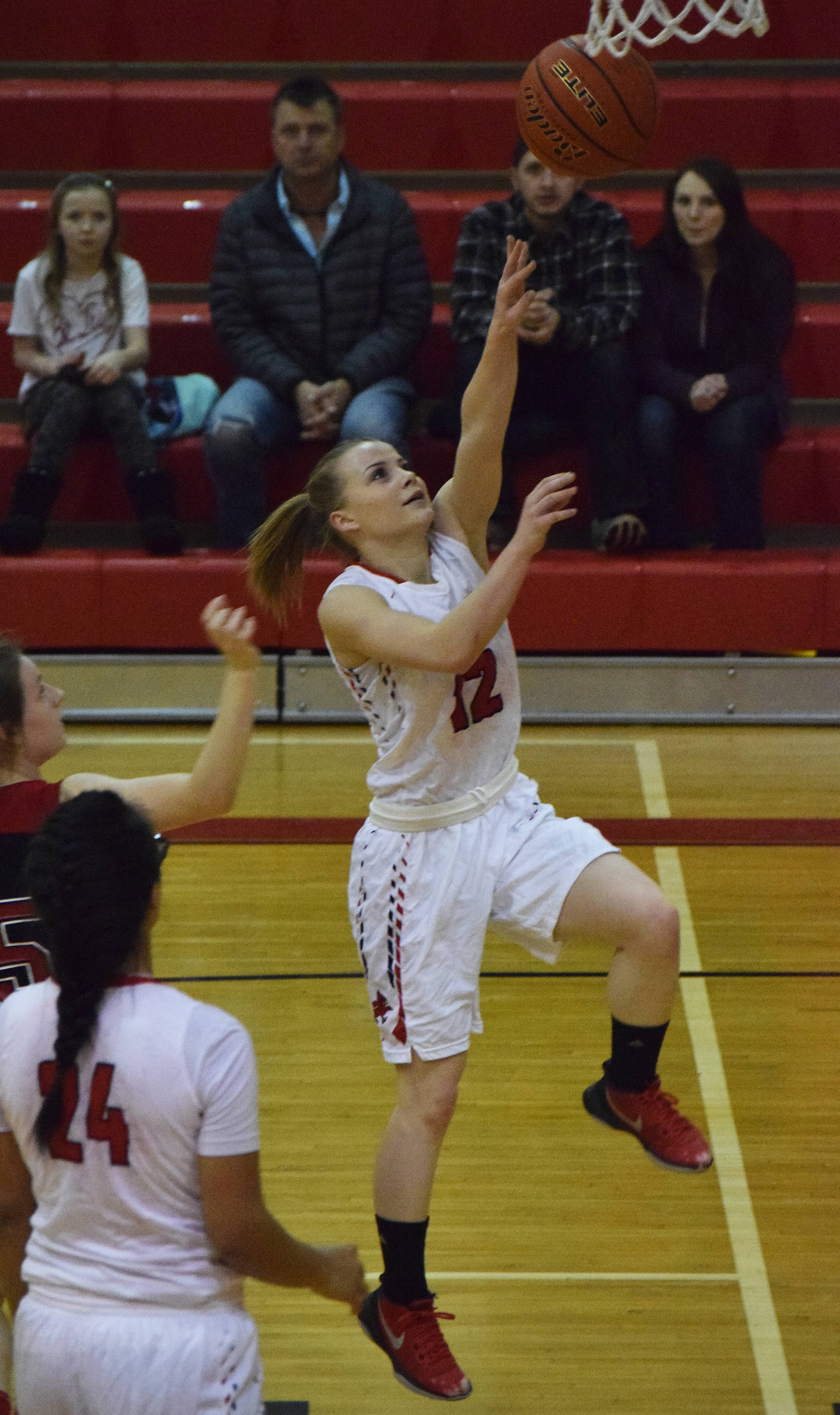 Kenai’s Hayley Maw lays in a bucket early in Saturday’s game against Juneau-Douglas at Kenai Central High School. (Photo by Joey Klecka/Peninsula Clarion)