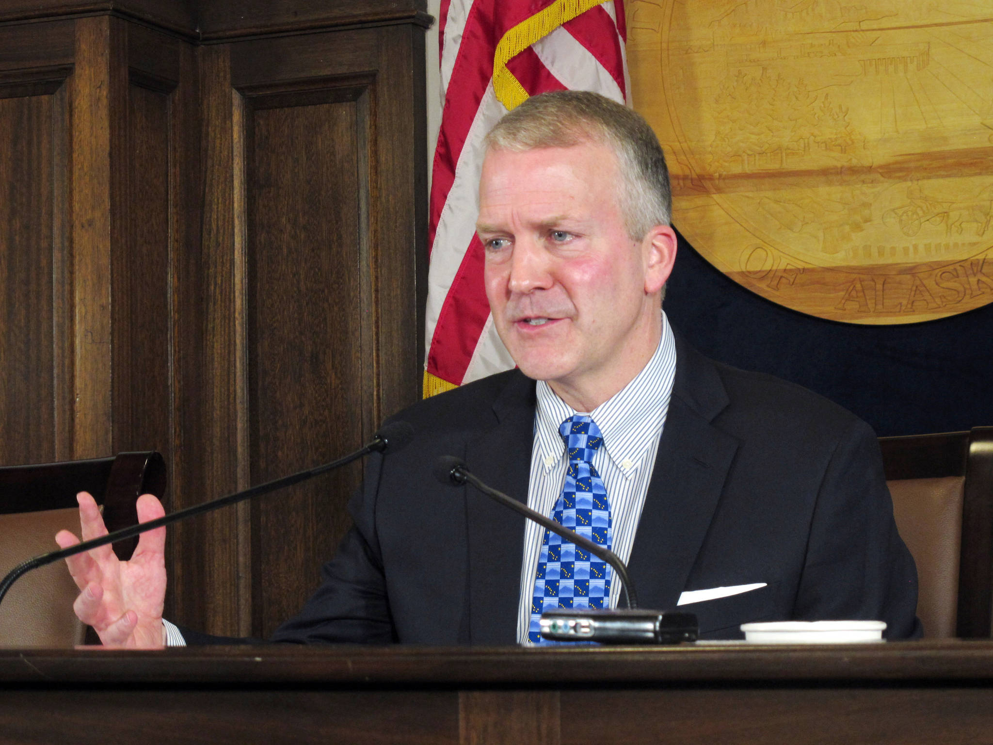 U.S. Sen. Dan Sullivan, R-Alaska, speaks to reporters after delivering an address to a joint session of the Alaska Legislature on Monday in Juneau. (AP Photo/Becky Bohrer)
