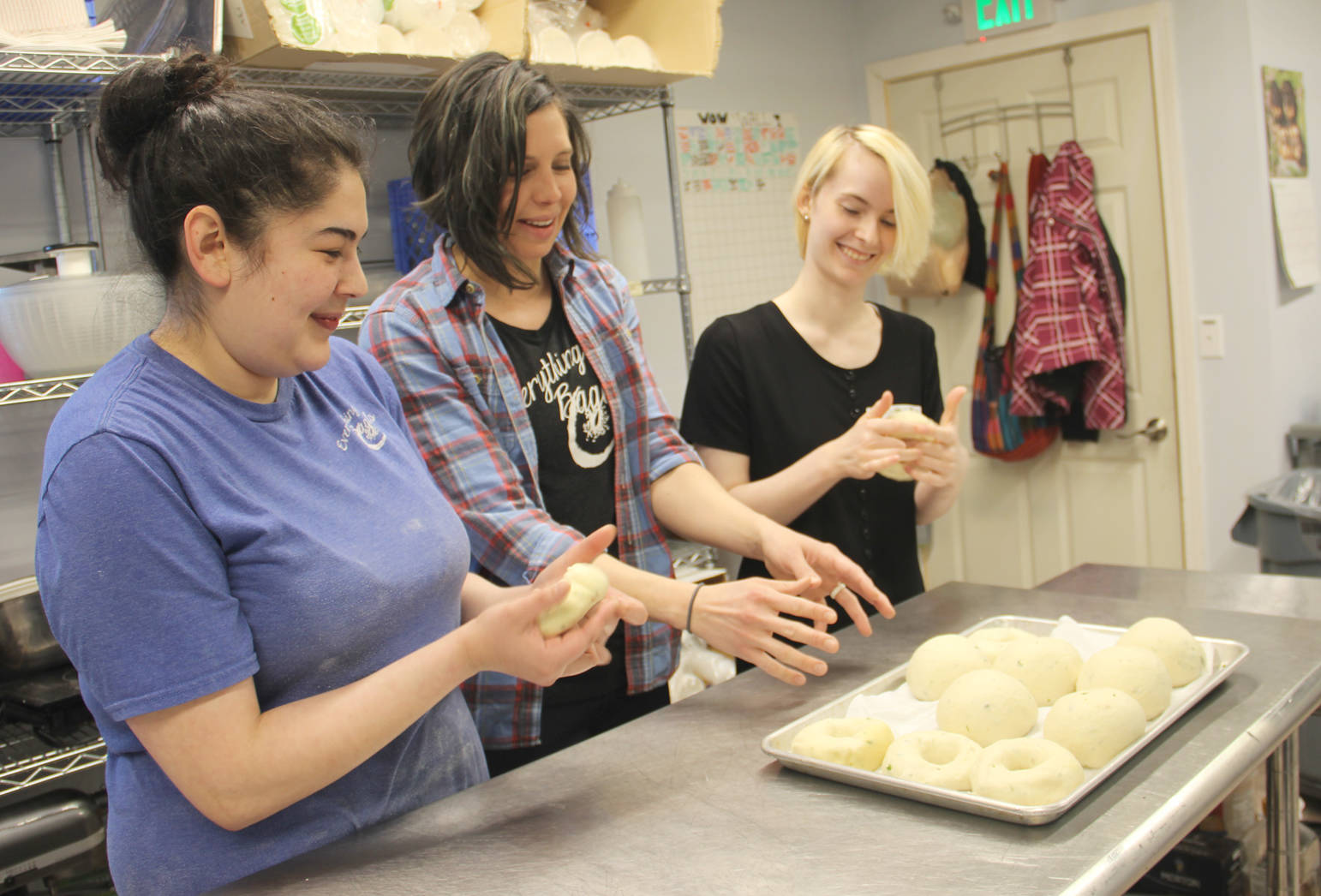 Kristeena Negus and Pamela Parker show Molly Nusbaum the art of making New York style bagels.