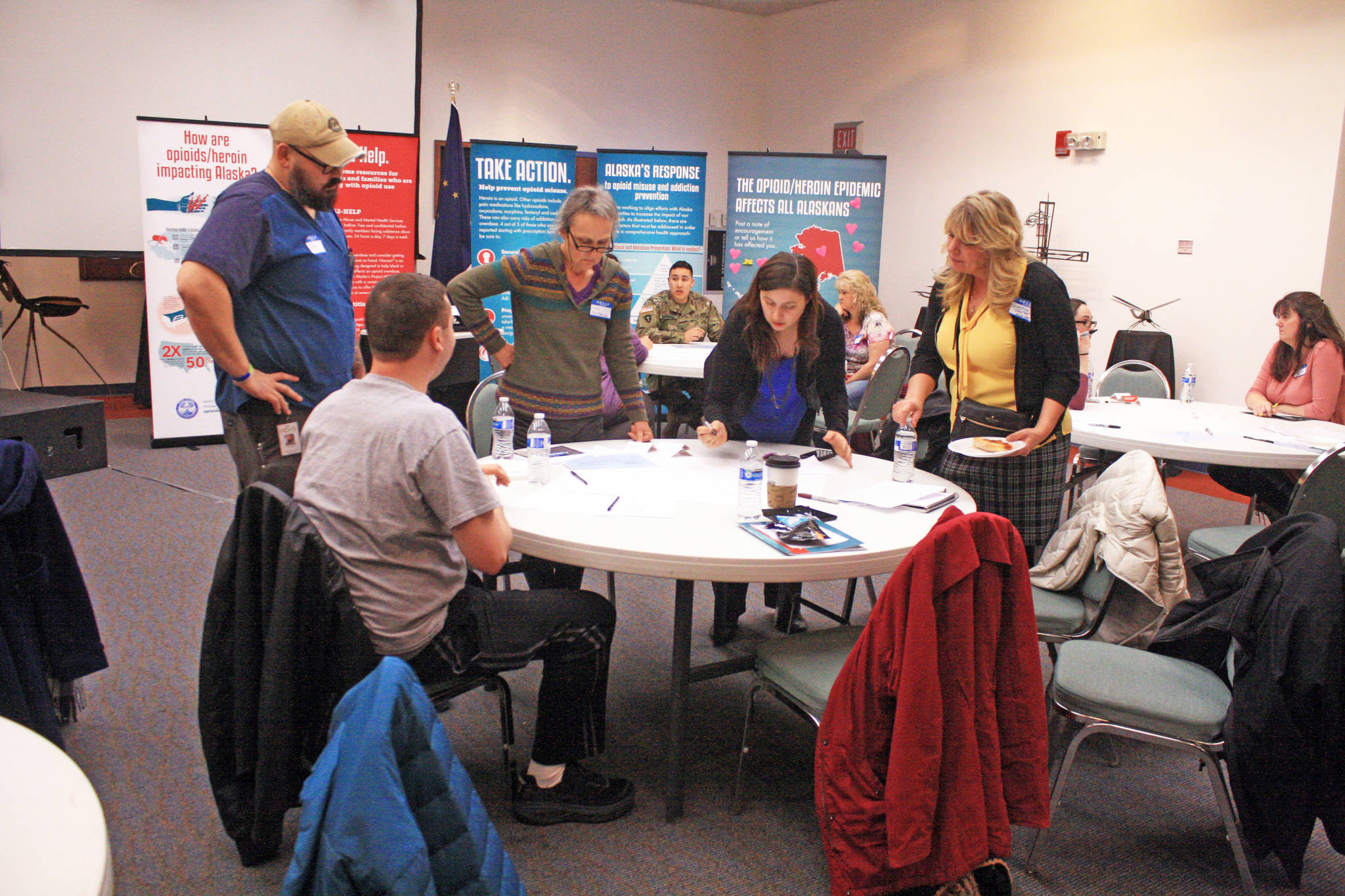 Members of the Kenai community brainstorm on opioid response efforts during the Your Voice, Your Community forum on Thursday, March 8, 2018 at the Kenai Visitors and Cultural Center in Kenai, Alaska. (Photo by Erin Thompson/Peninsula Clarion)
