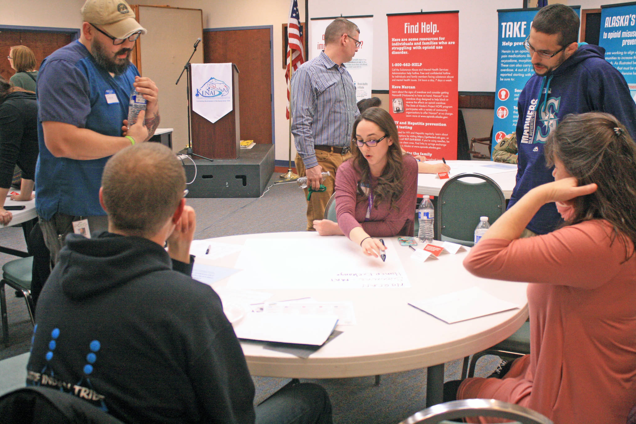 Members of the Kenai community brainstorm on opioid response efforts during the Your Voice, Your Community forum on Thursday, March 8, 2018 at the Kenai Visitors and Cultural Center in Kenai, Alaska. (Photo by Erin Thompson/Peninsula Clarion)