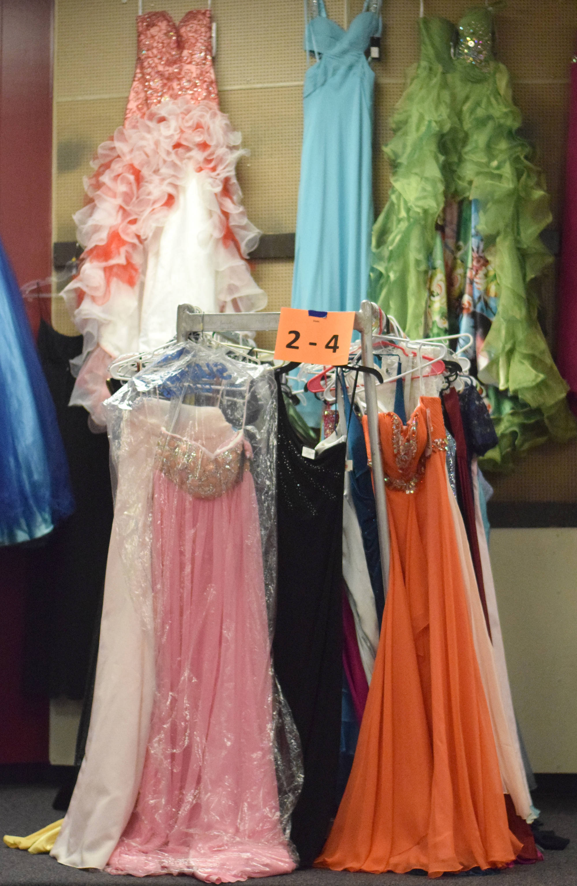 Dresses line the walls of Soldotna Prep School Friday for Cinderella’s Closet, a program that provides free prom dresses and accessories to girls throughout the school district. (Photo by Kat Sorensen/Peninsula Clarion)