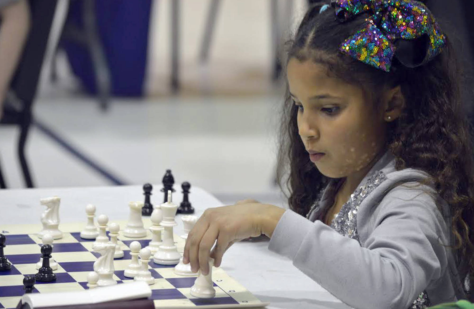 Checkmate Marlee Riggins from Bill Vedders’ third grade class at K-Beach Elementary competes in the chess club tournament earlier this month. The chess club, which is coached by third-grade teacher Cheryl Romatz, at the school has grown to become the “cool thing” to do according to Vedders. (Photo courtesy of Bill Vedders)