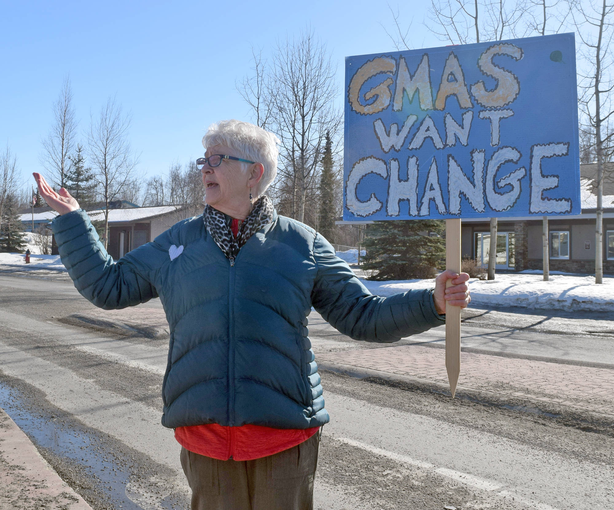 Susan Smalley walks Christ Lutheran Church, along the Kenai Spur Highway, to the Kenai Peninsula Borough building in Soldotna on Saturday as part of the national March for Our Lives rally, which took place in cities and towns across the country in support of gun control laws. (Photo by Kat Sorensen/Peninsula Clarion)