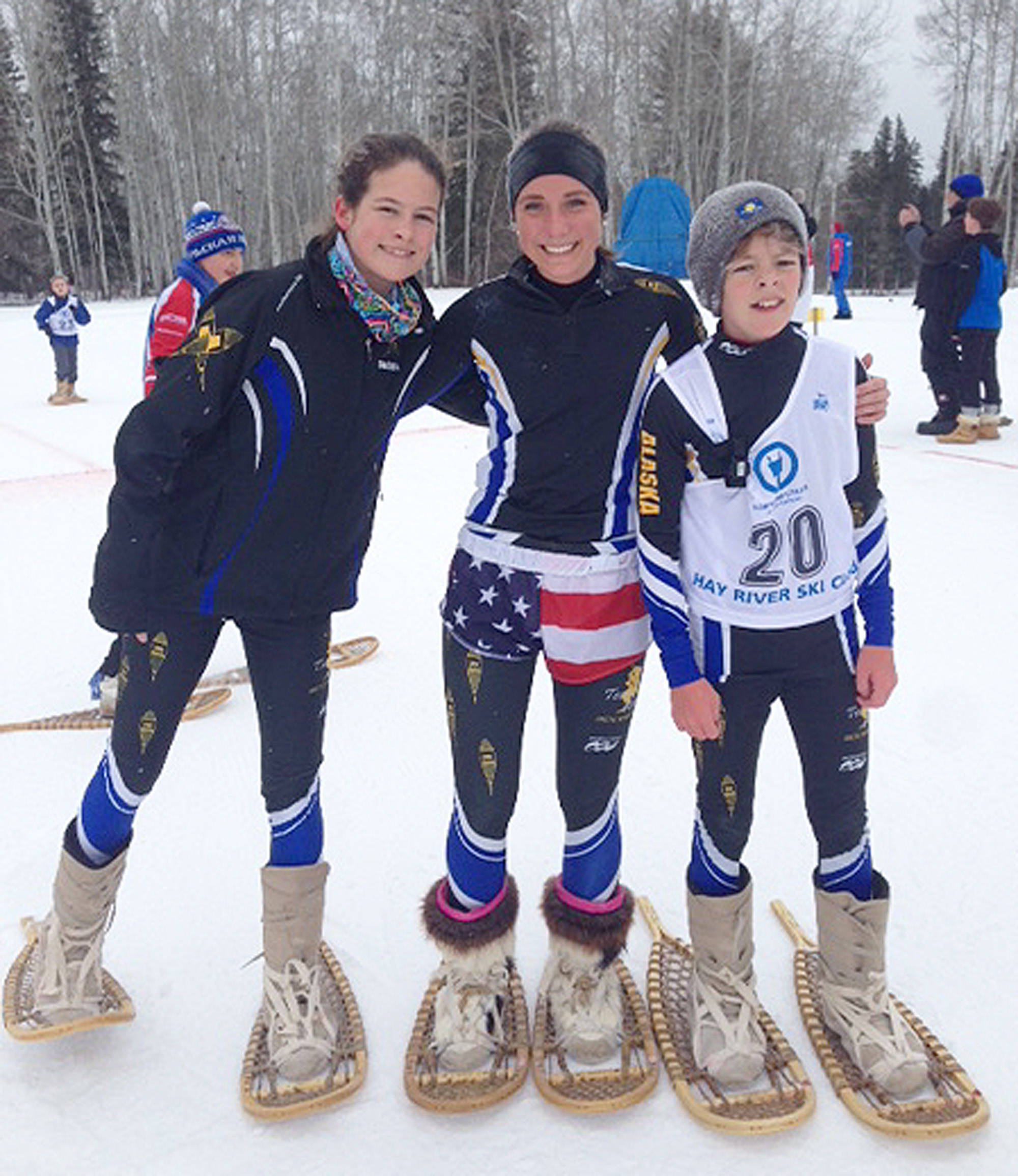 Kenai’s Riana Boonstra (center) poses with Alaska teammates and fellow Kenai Peninsula athletes Leah (left) and Greg Fallon at the 25th biannual Arctic Winter Games in Hay River, Canada. (Photo provided by Kelli Boonstra)