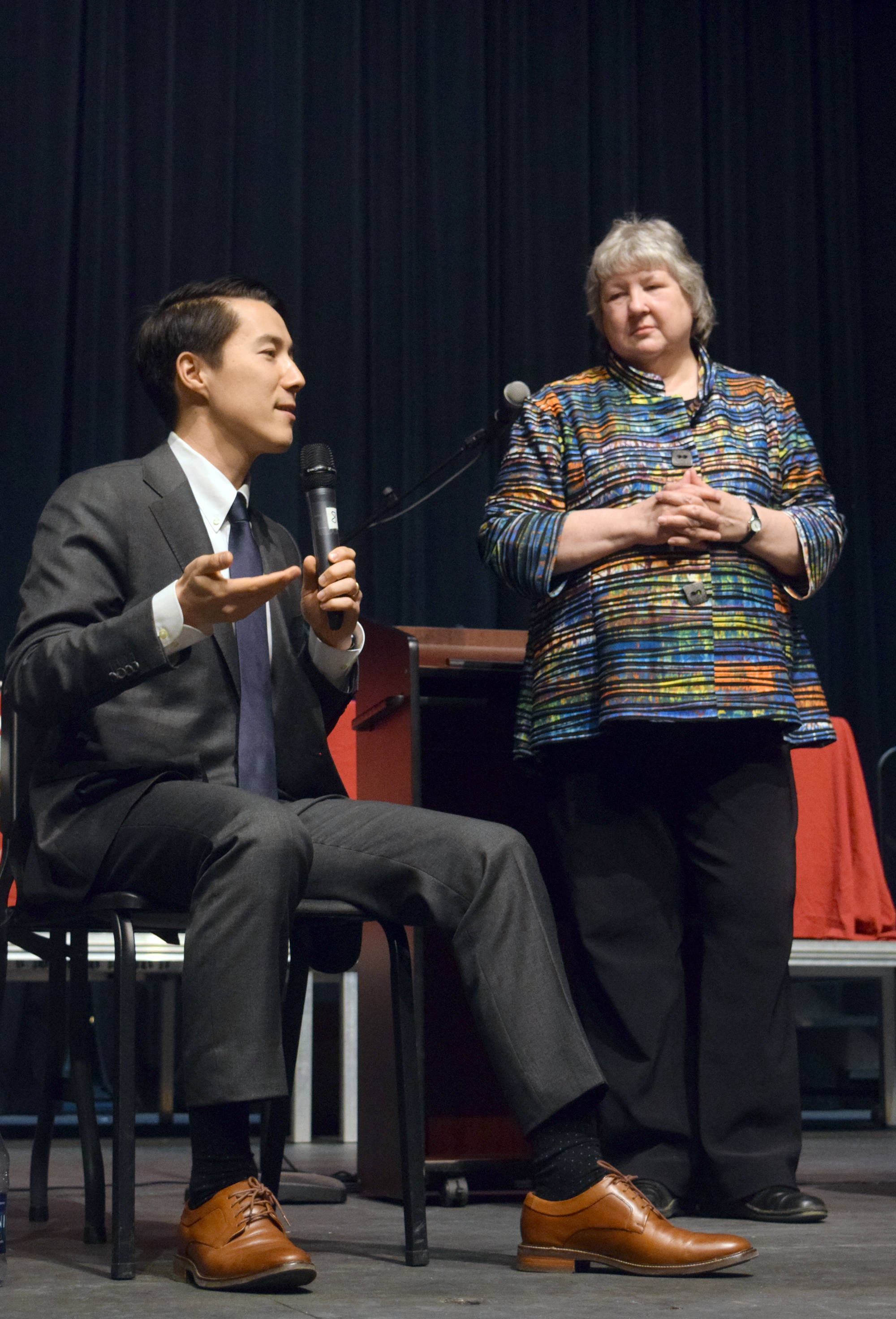 Attorney Jon Choate, left, representing the Alaska Democratic Part discusses the ins and outs of the case after the oral arguments on Thursday as part of the Supreme Court Live event moderated by Marilyn May, right at Kenai Central High School. (Photo by Kat Sorensen/Peninsula Clarion)