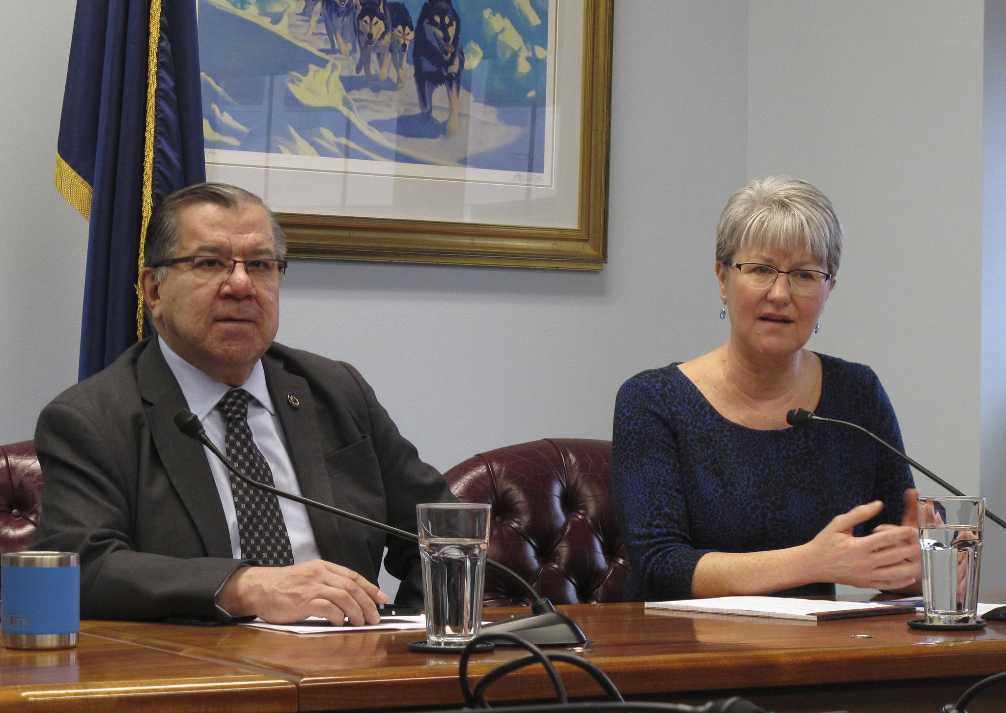 Alaska Senate Finance Committee co-chair Anna MacKinnon, right, answers a question during the Senate majority’s weekly news conference on Monday, April 9, 2018, in Juneau, Alaska. Topics covered during the event included caucus priorities as the scheduled end of the legislative session nears. Also pictured is MacKinnon’s finance co-chair, Sen. Lyman Hoffman. (AP Photo/Becky Bohrer)