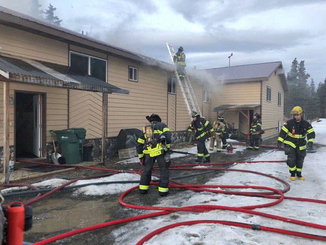 Central Emergency Services firefighters work to extinguish a blaze in an apartment building on Cork Line Drive in the Kalifornsky Beach area on Monday, April 9, 2018 near Kenai, Alaska. No one was reportedly hurt in the blaze, and the cause of the fire is still under investigation. (Photo courtesy Roy Browning/Central Emergency Services)