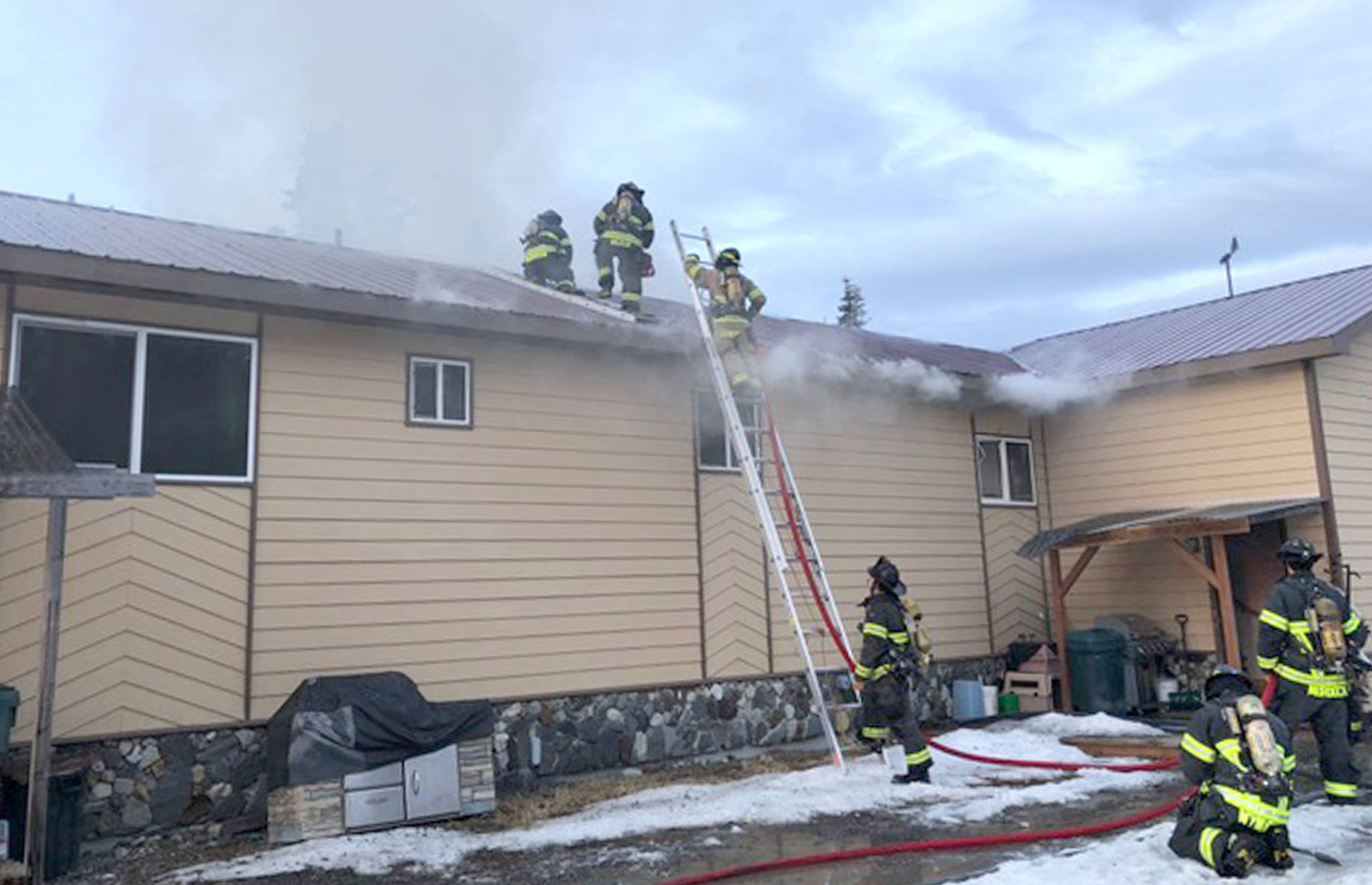 Central Emergency Services firefighters work to extinguish a blaze in an apartment building on Cork Line Drive in the Kalifornsky Beach area on Monday, April 9, 2018 near Kenai, Alaska. No one was reportedly hurt in the blaze, and the cause of the fire is still under investigation. (Photo courtesy Roy Browning/Central Emergency Services)