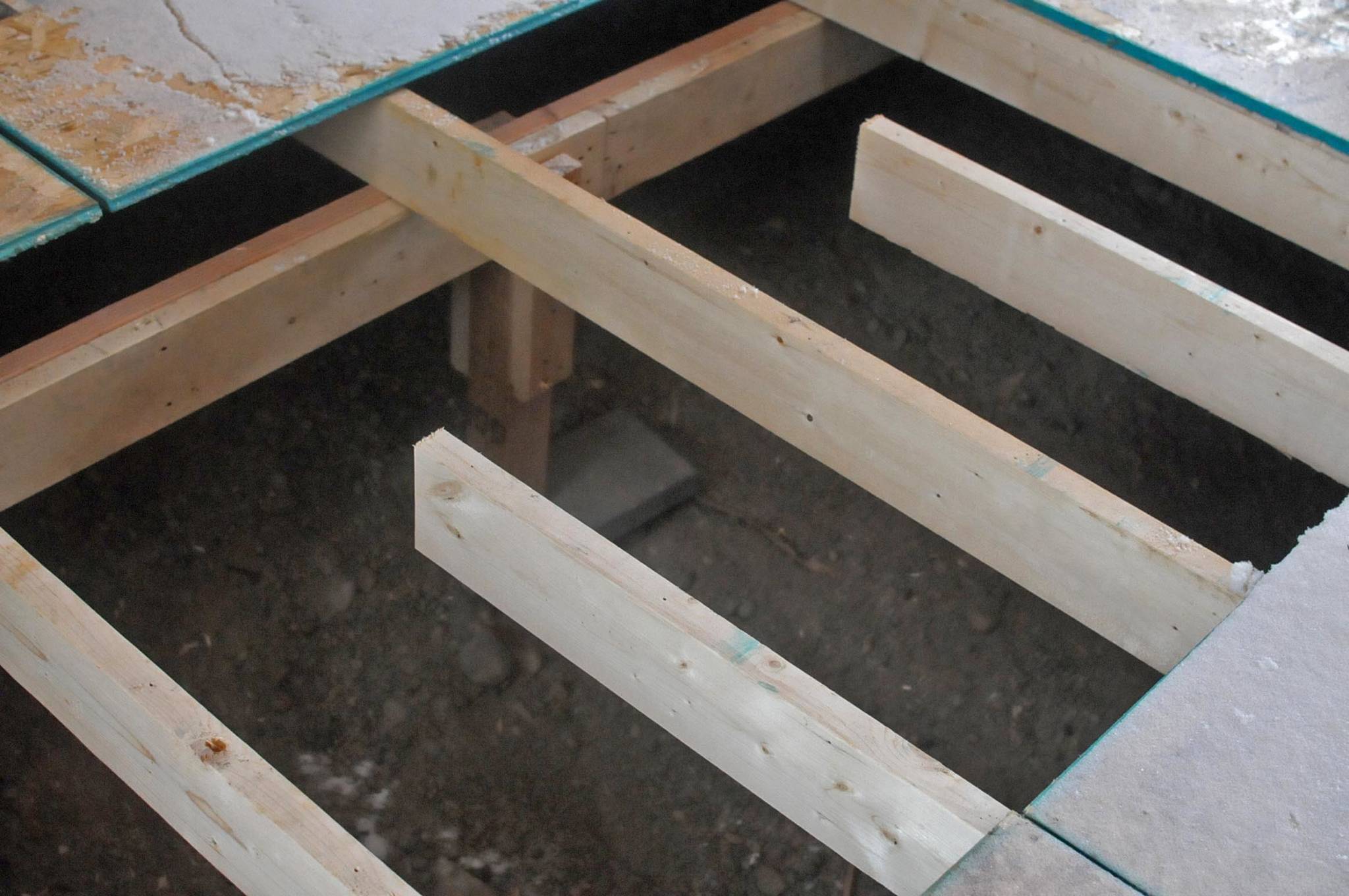 This Friday, March 9, 2018 photo shows the space beneath Nikiski resident Kimbra Mensch’s home, which is currently being torn down, in Nikiski, Alaska. The contractor Mensch hired to build her home left her with 48 building violations, resulting in an unsafe building she is having to pay to have torn down and start over. (Photo by Elizabeth Earl/Peninsula Clarion)