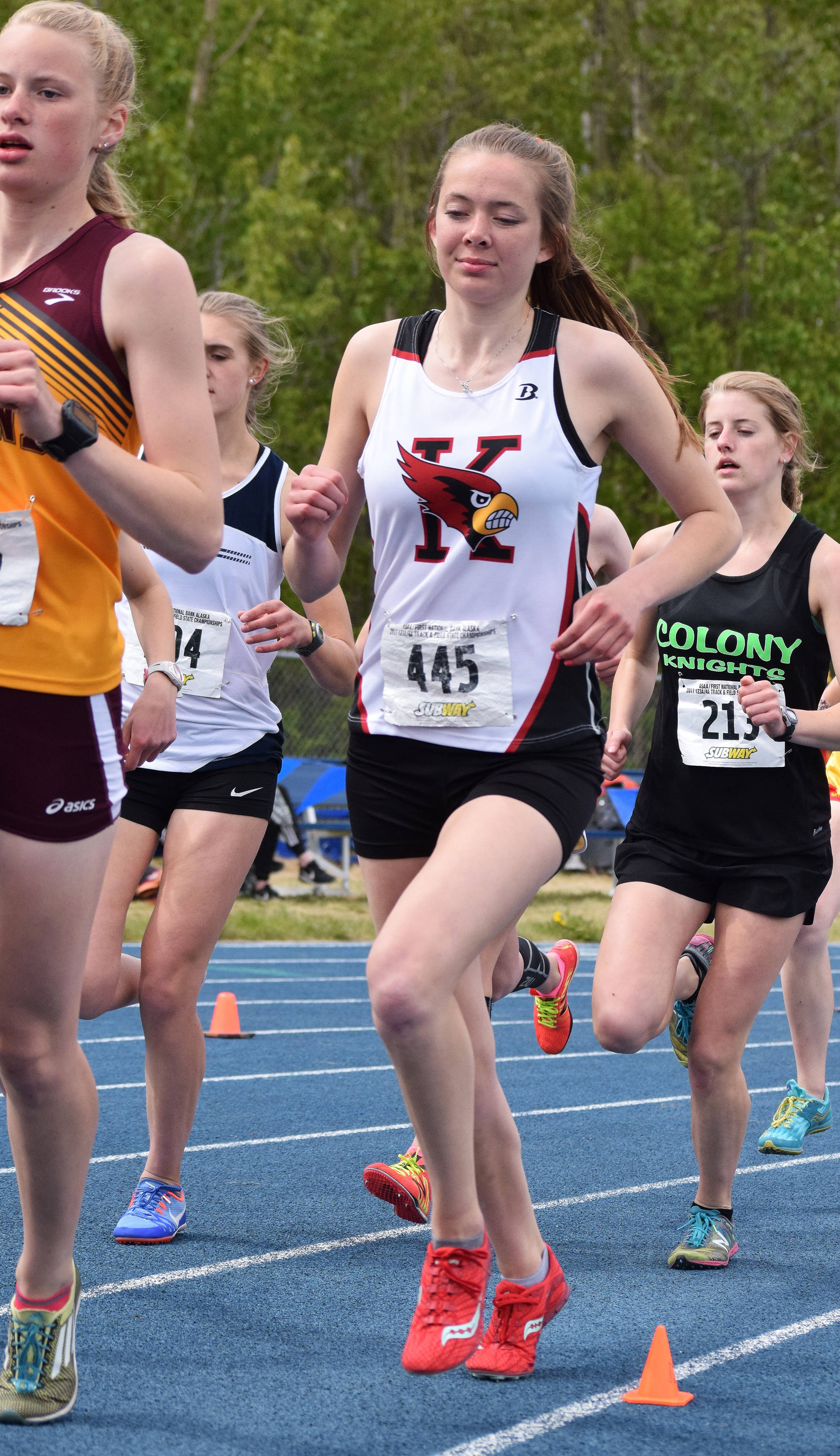 Kenai Central’s Brooke Satathite races the Class 4A girls 1,600-meter event May 27, 2017, at the Alaska state track & field championships at Palmer High School. (Photo by Joey Klecka/Peninsula Clarion)