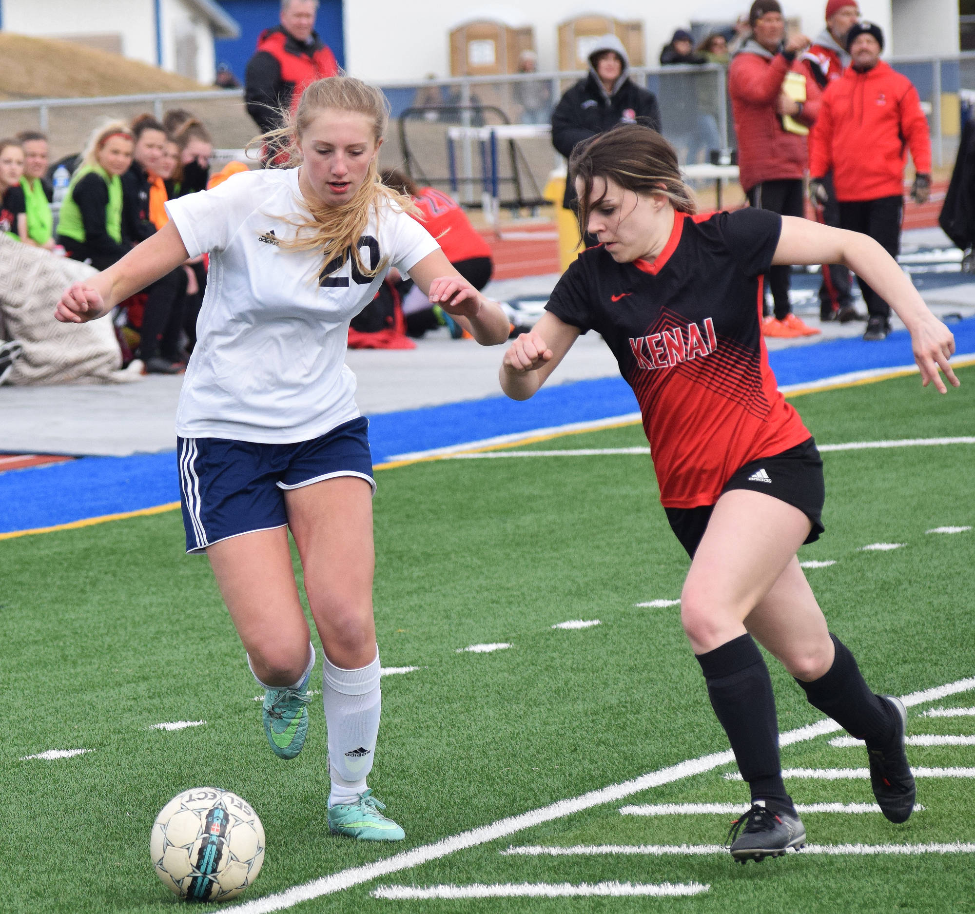 Soldotna’s Cameron Blackwell and Kenai’s Alissa Maw battle for the ball Tuesday at Justin Maile Field in Soldotna. (Photo by Joey Klecka/Peninsula Clarion)