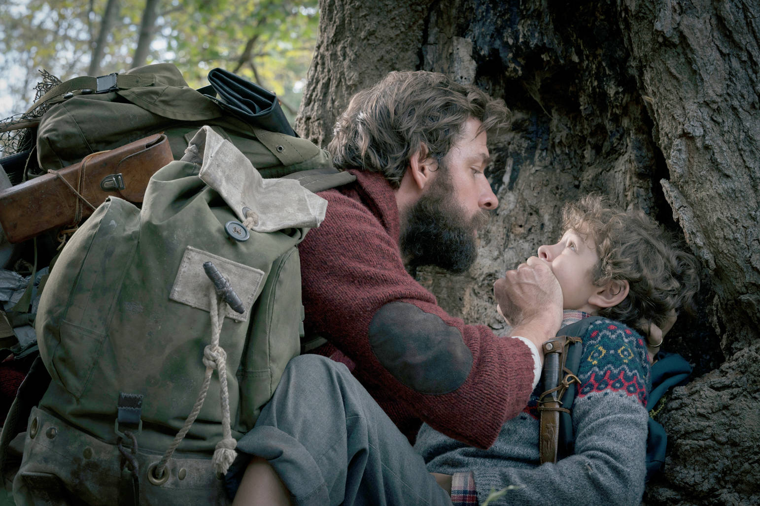This image released by Paramount Pictures shows John Krasinski, left, and Noah Jupe in a scene from “A Quiet Place.” (Jonny Cournoyer/Paramount Pictures via AP)